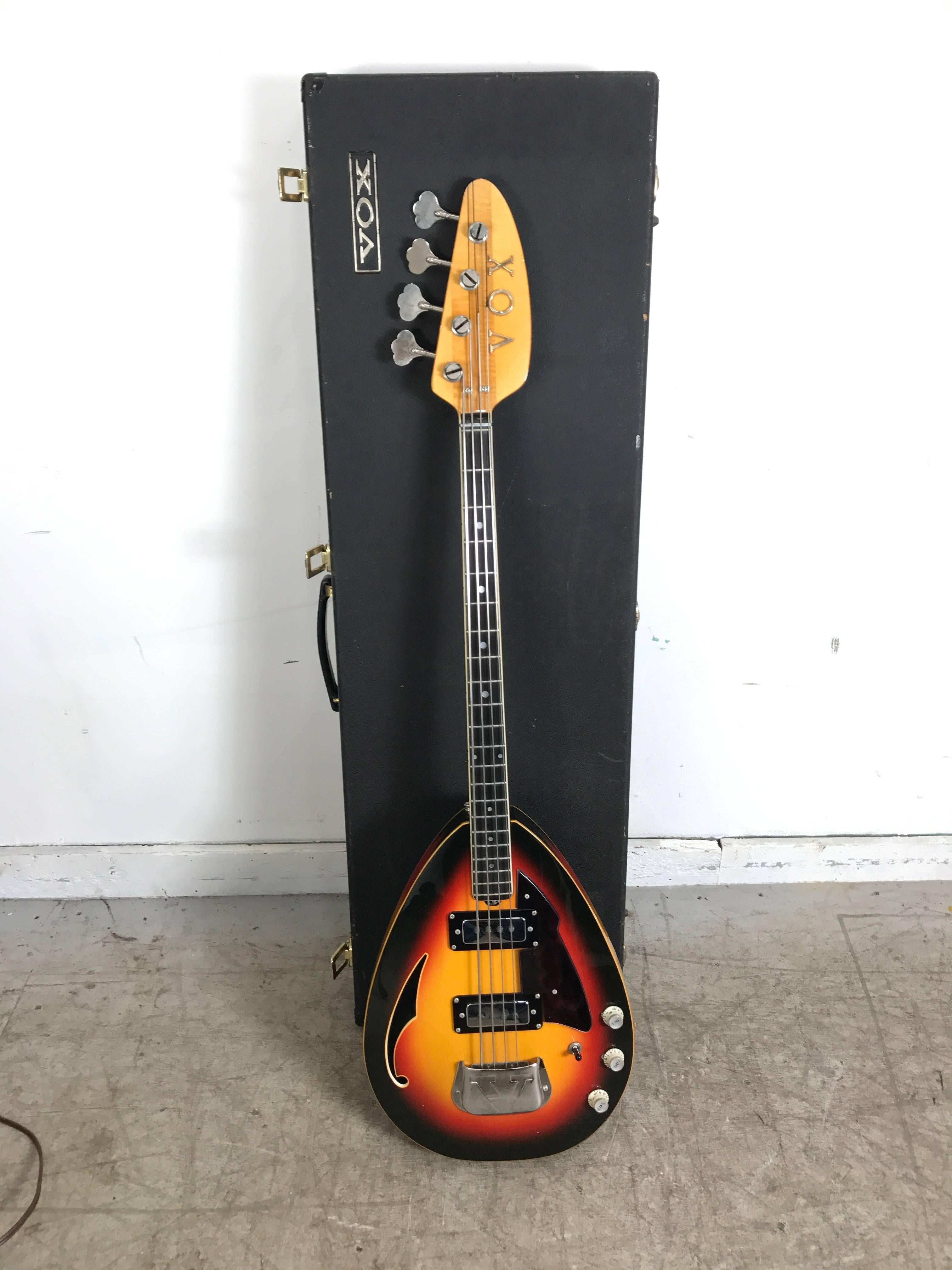 Rare 1968 Vox teardrop bass guitar V284 Stinger IV, made in Italy, tested and in fine working condition. Low action. Straight neck, retains original Vox hard shell case.