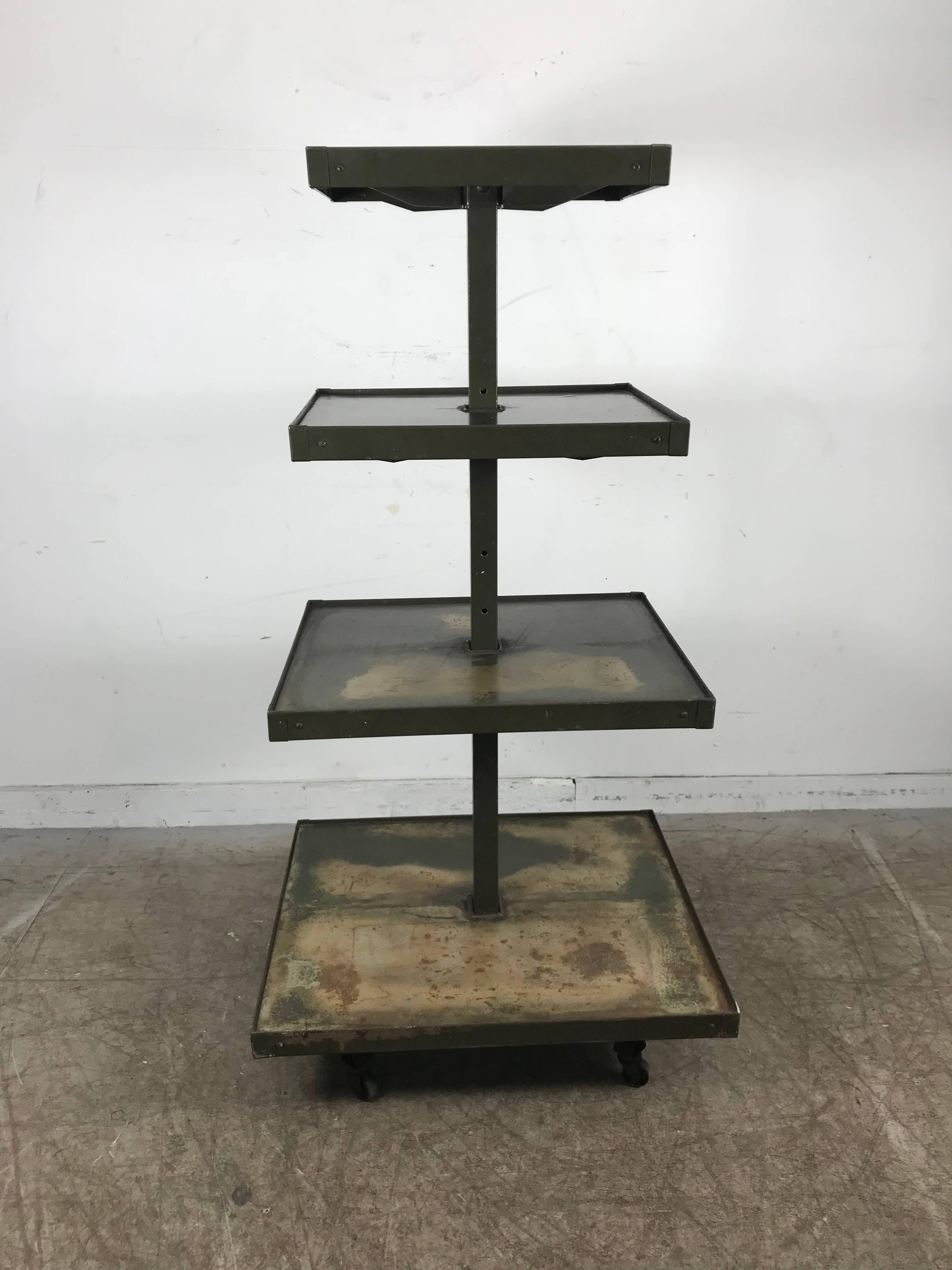 American Industrial 4 tier rolling display stand, distressed finish.Dayton Display Co.