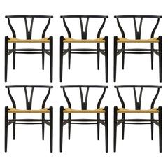 Set of Six Hans Wegner Ebonized Oak Wishbone CH24 Dining Chairs