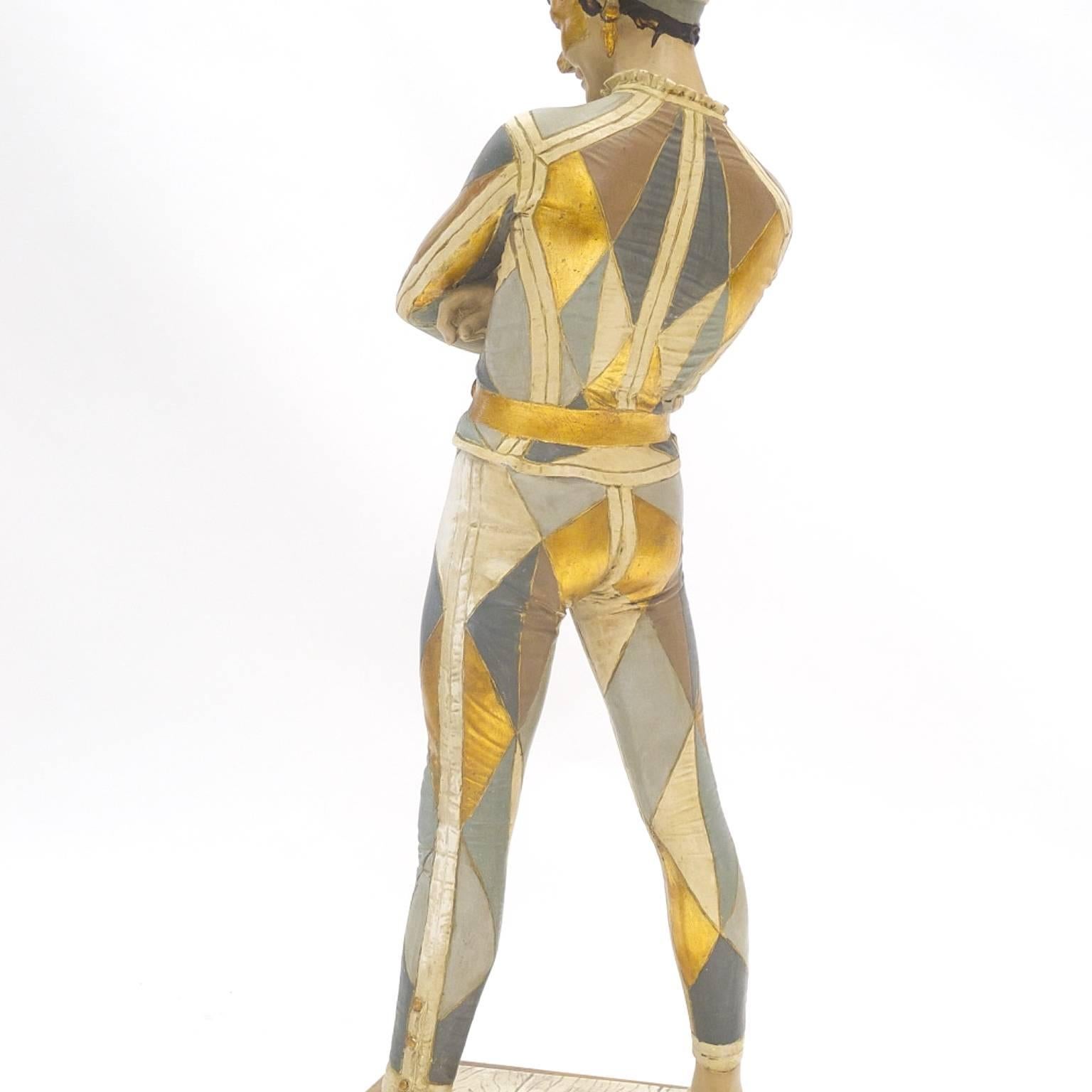 Harlequin Jester lamp by The Marbro Lamp Company, 1968. The design is based on an 1879 bronze sculpture, with “1879 – St. Marceaux” inscribed on the base. Please note that this is the much larger and more rare version. Comes with original shade. The
