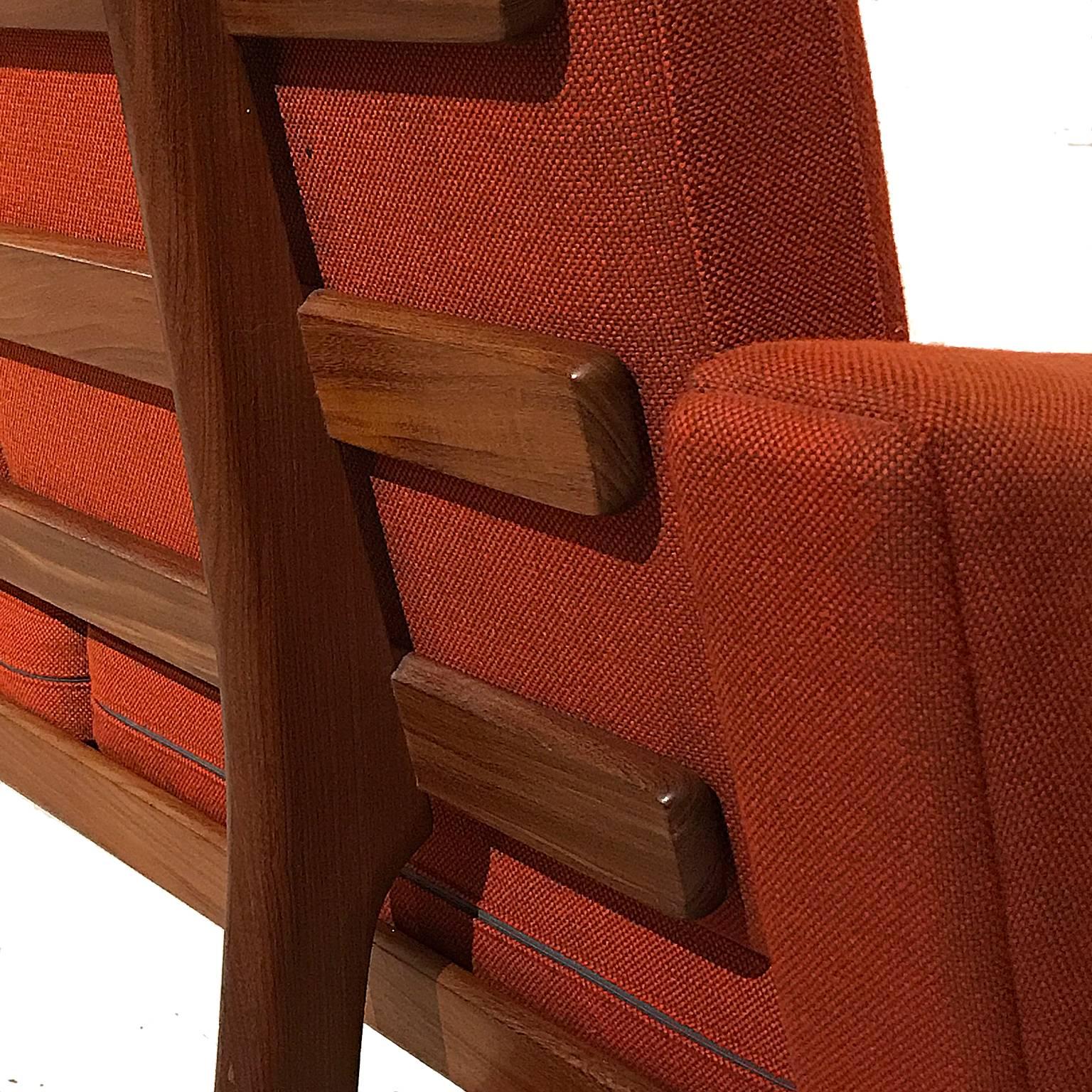 Hans Wegner teak frame sofa by GETAMA with original fabric and spring cushions. Very minor marks on feet otherwise near excellent condition.
