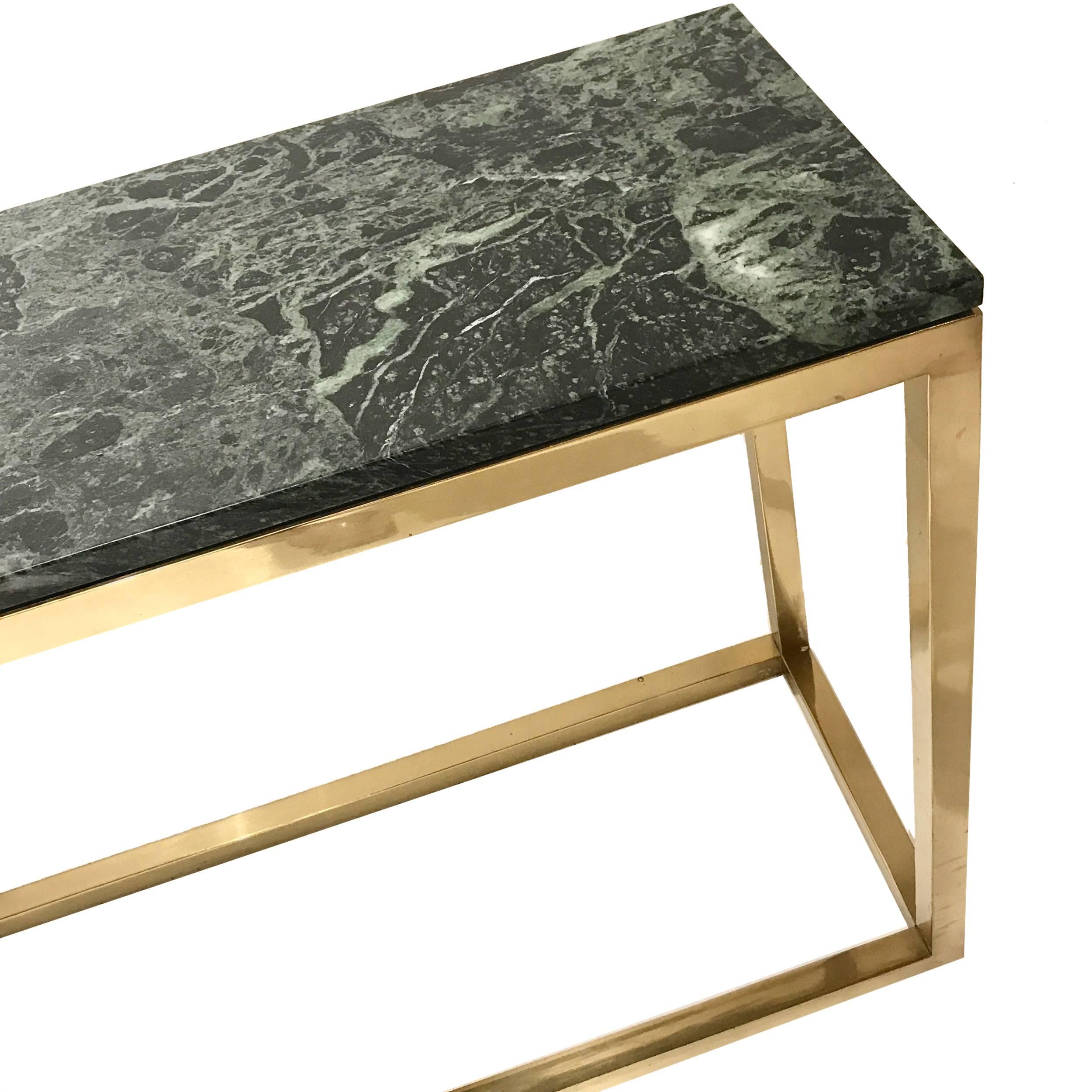 Stunning green marble with gorgeous veining set on a brass frame base.