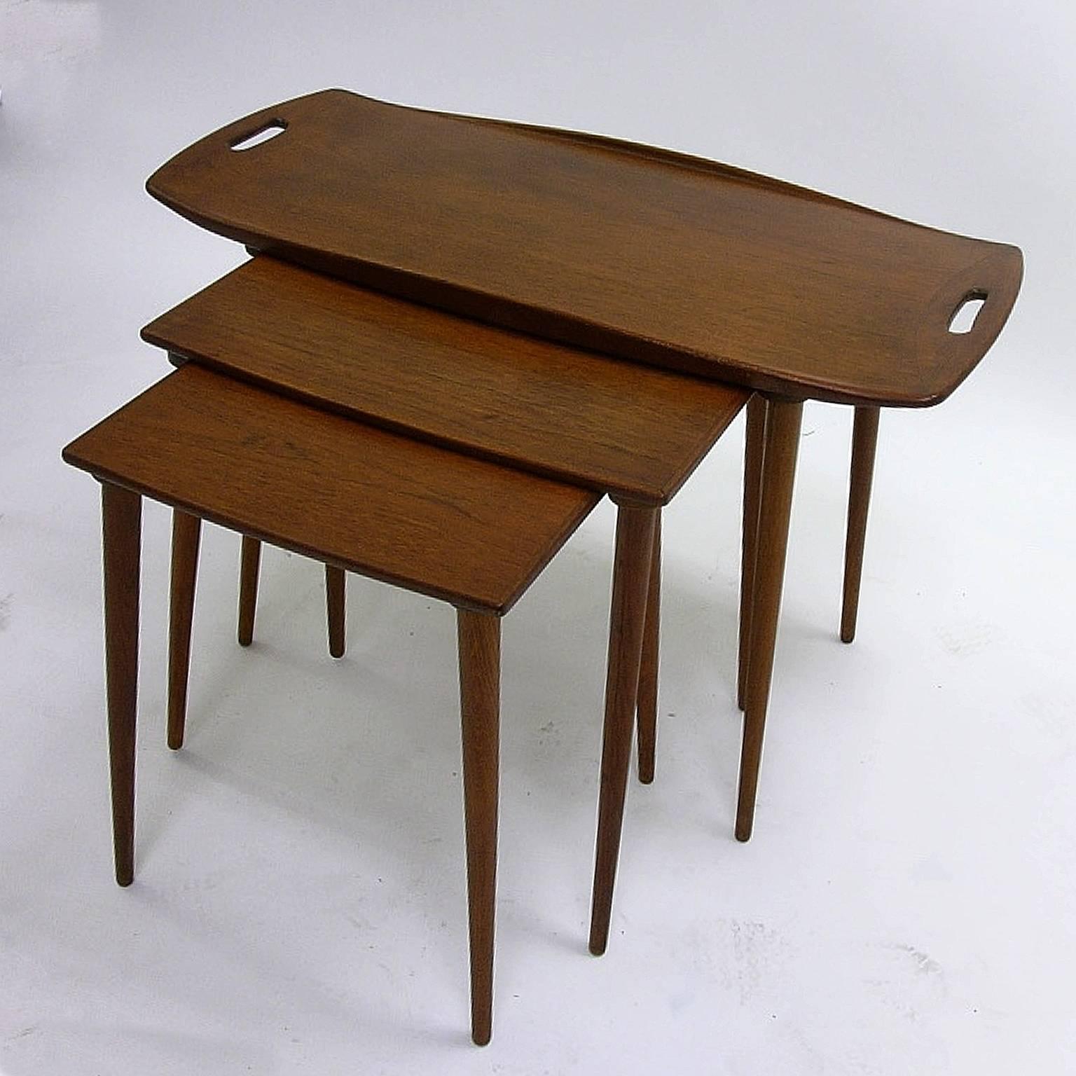 Fantastic set of Danish nesting tables designed by Jens Quistgaard.
Measurements of each table or Stand are:
31 1/8