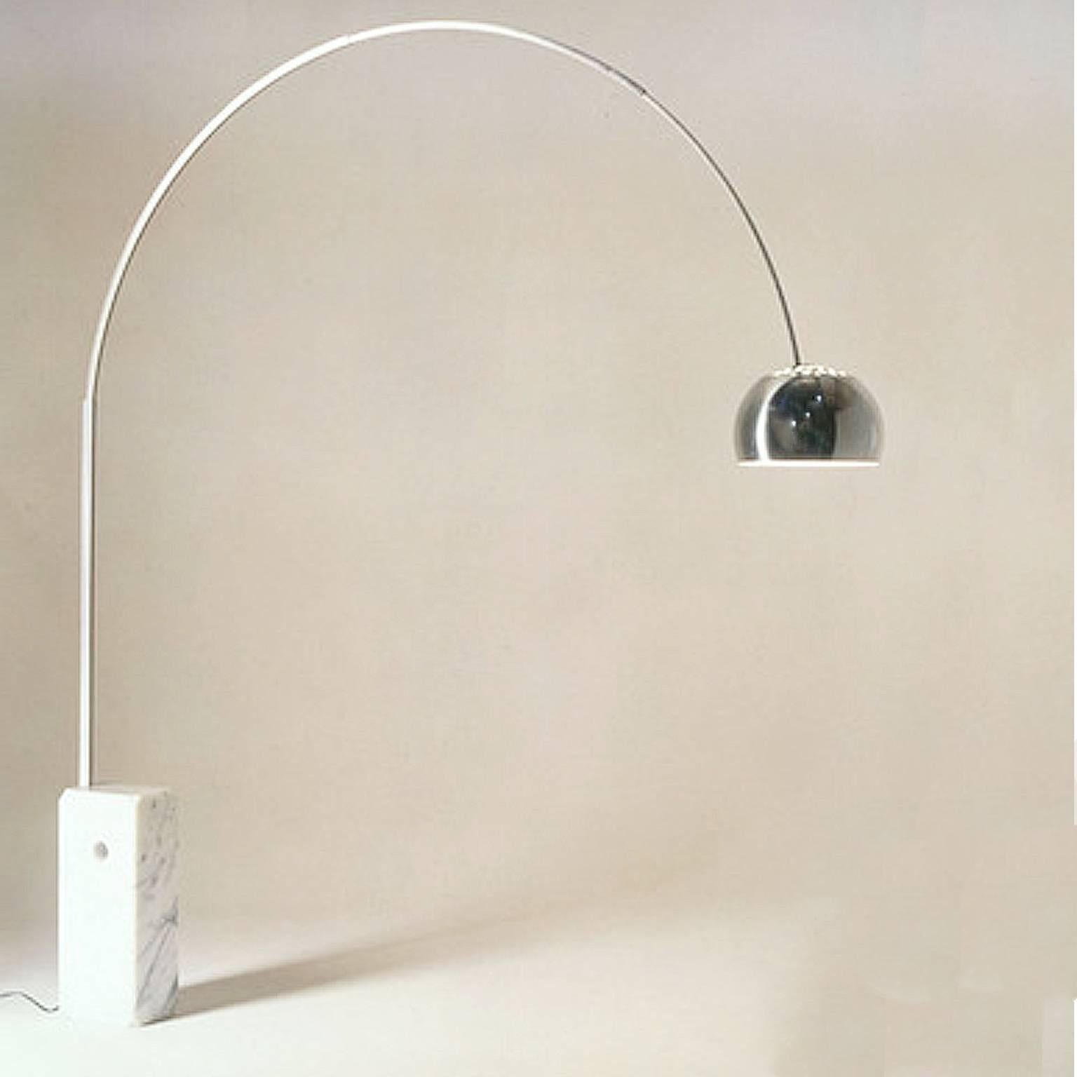 Designed in 1962, an original iconic Arco lamp. Ideal over sofas or dining tables. Made in Italy by Flos. Original label intact. Floor switch has been replaced by foot pedal type power control.