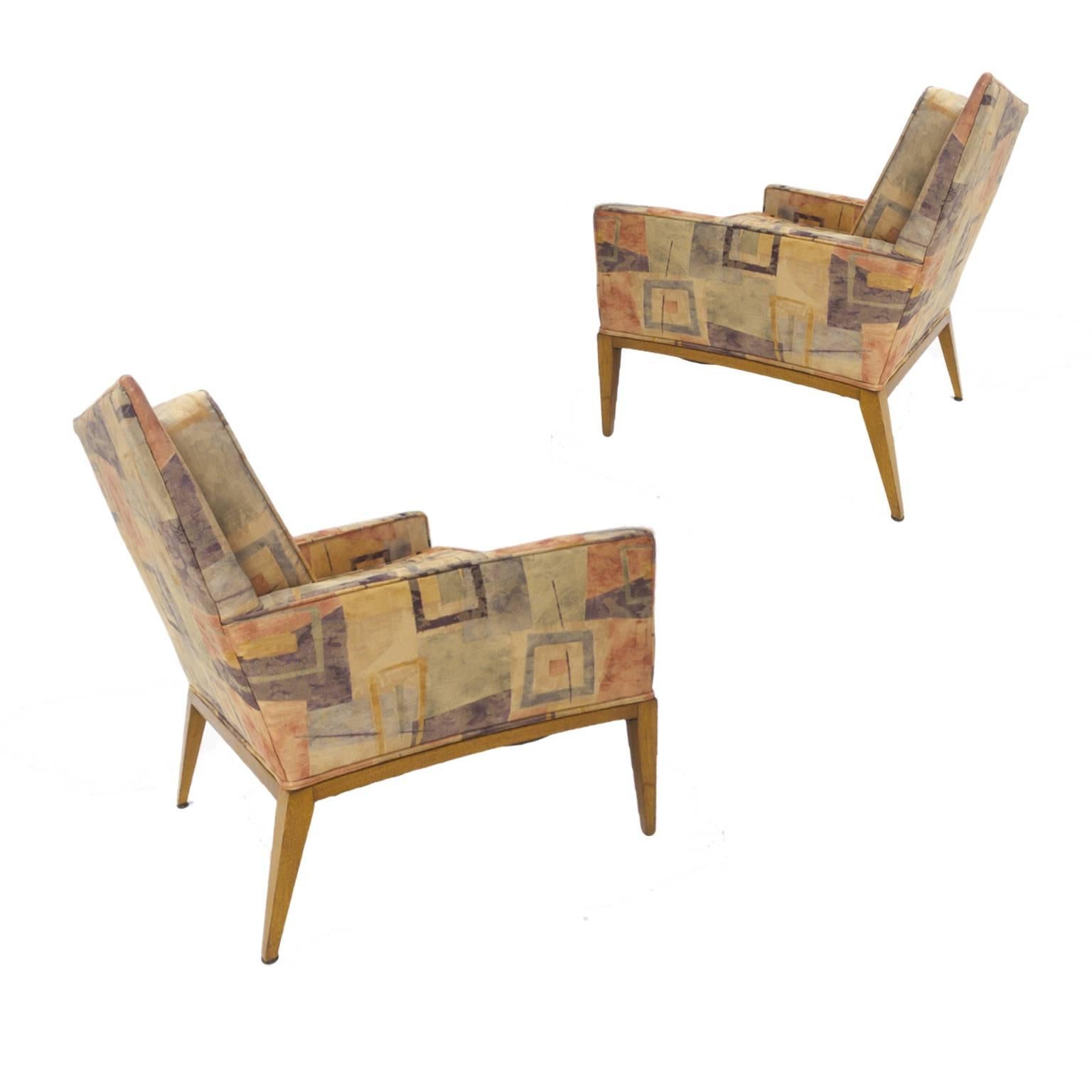 A very sleek pair of rarely offered Harvey Probber lounge chairs. They feature a curved arm and bleached mahogany frames.                                                                 * 21 inch arm height,18 inch seat height.