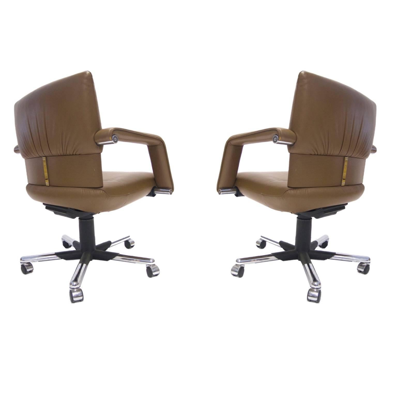 Mario Bellini extra wide swivel and reclining executive chairs on casters. Made in high quality leather by Vitra. Priced per chair, two available.
 