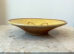 Antique Provençal Earthenware Tourne-Omelette in yellow with a red motif