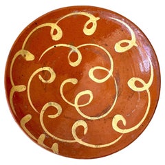 Antique Provençal Earthenware Tourne-Omelette with swivel motif