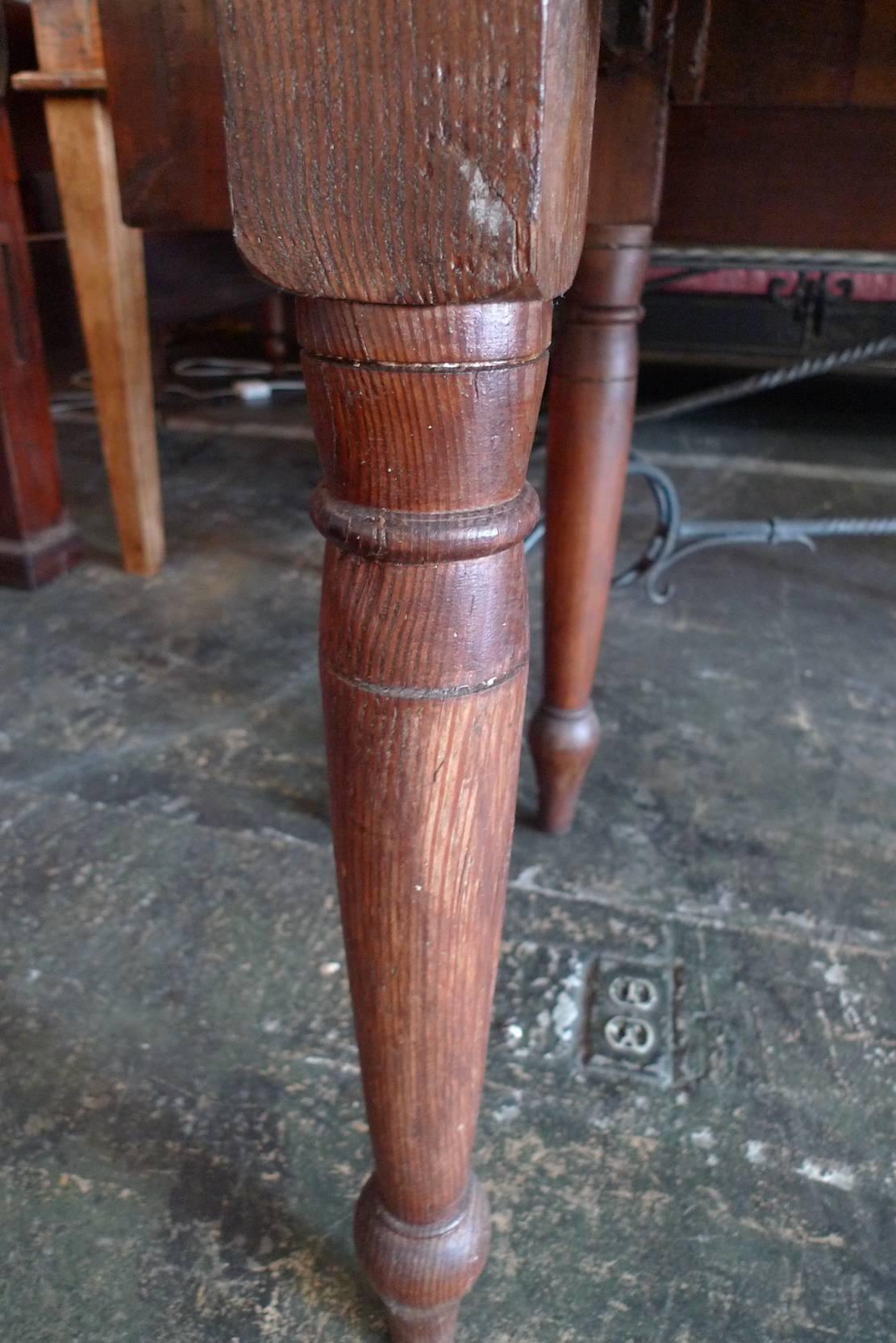American New England, Early 19th Century Long Harvest Table with two drop-leaf sides.