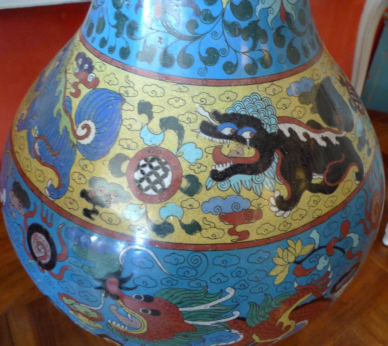 Chinese late 19th century large cloisonné enamel vase with decorative dragon motif. The top and bottom are banded with brass.
Measures: Height 23.50”; diameter 16.50”
$2,500
$2,125 trade.