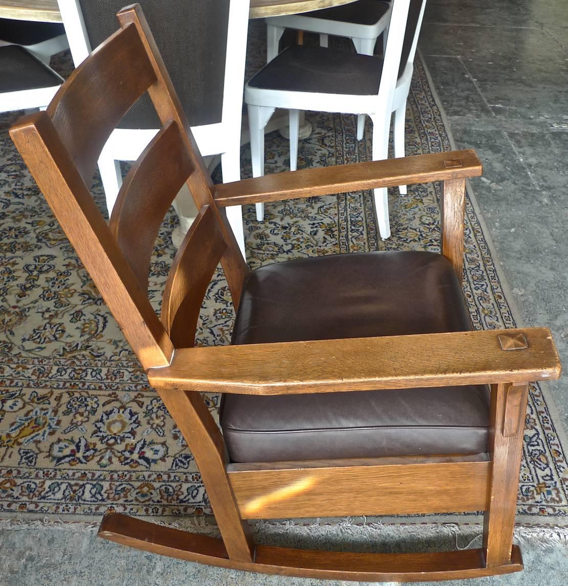 American Lifetime Furniture Arts & Crafts Mission rocking chair, with a leather seat cushion.
