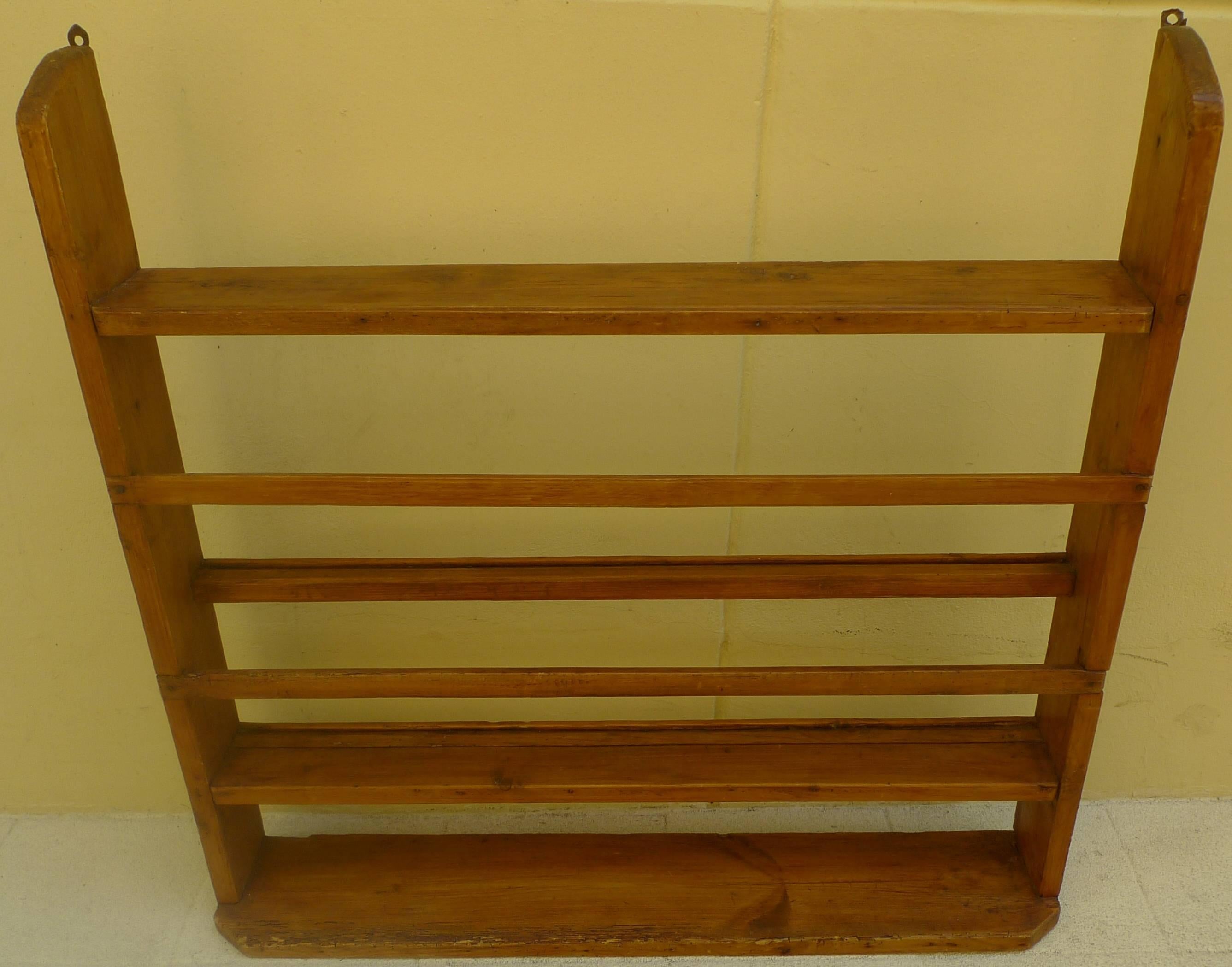 French 19th century wood wall plate rack with three shelves.