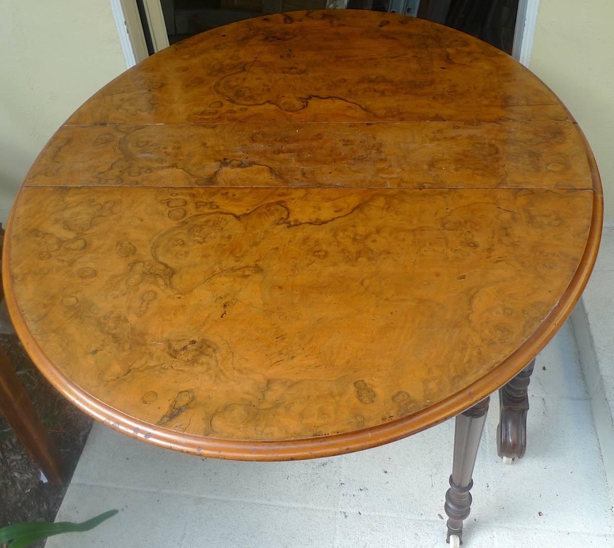 Stained English 19th Century Burl Walnut Top, Drop-Leaf Table with Carved Legs on Wheels