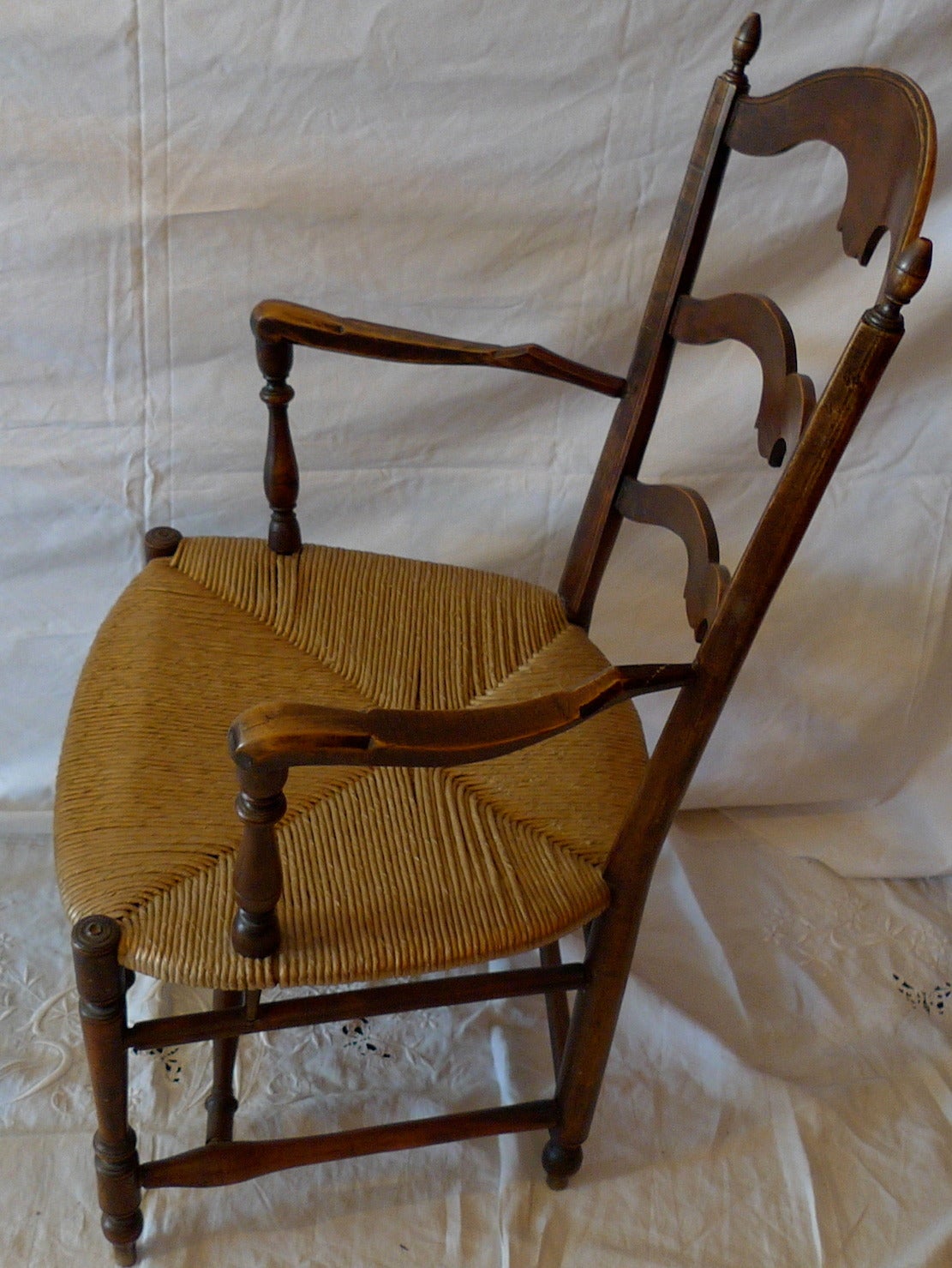 French 19th Century Country Ladder Back Armchair with Rush Seat In Distressed Condition In Santa Monica, CA