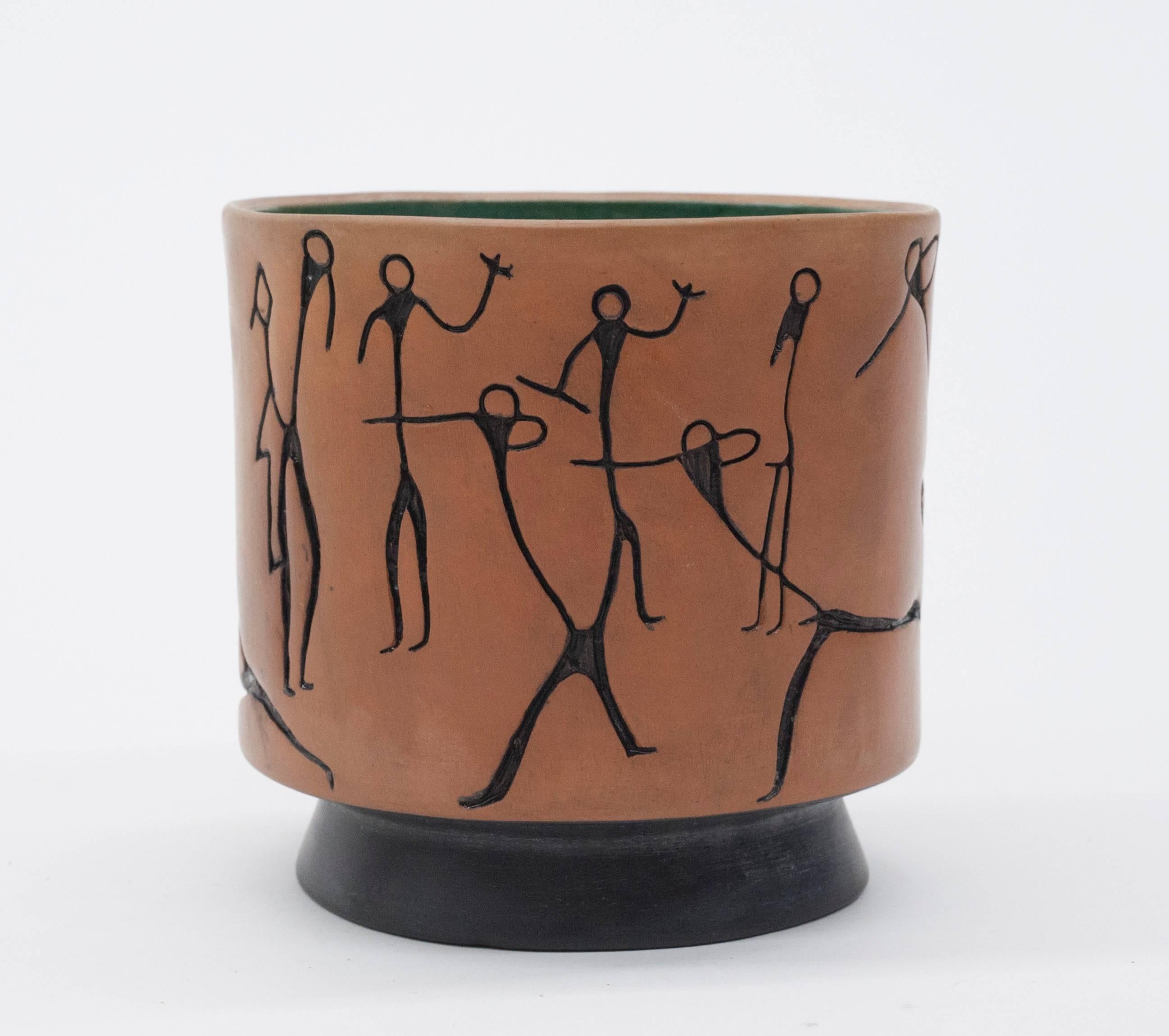 Very nice old ceramic planter from Texococo Mexico. Planter is beautifully executed with incised figures.  Figures are similar in style to some of Los Castillo's work in the 1950s. Condition is excellent with no chips or cracks. Planter measures
