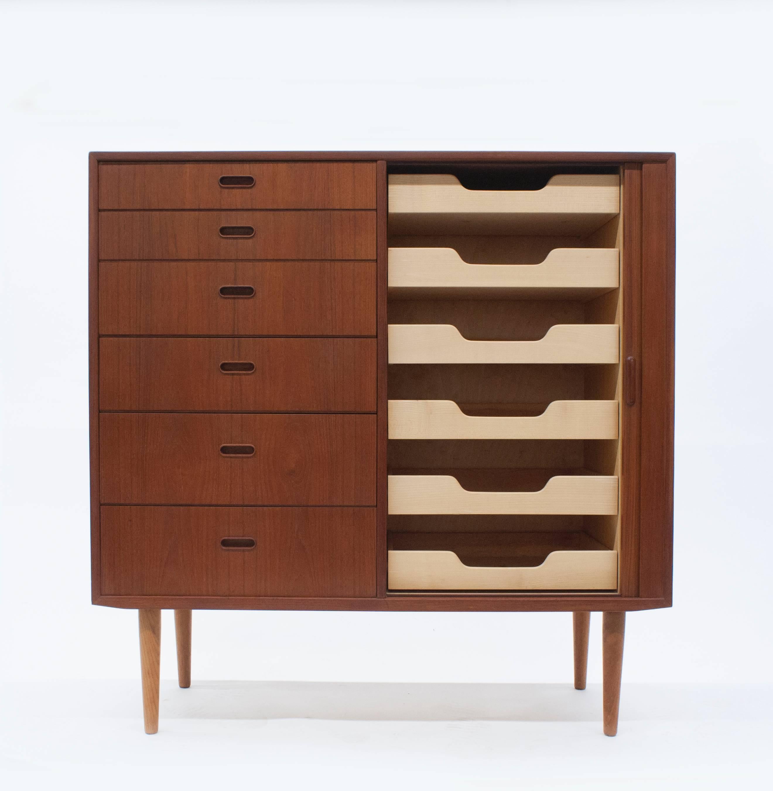 Well-constructed and very functional chest of drawers by Falster. Birch interior is clean. 12 drawers provide plenty of storage. Dresser does have some marks to lower right side and a few light marks to top. Please see photographs.