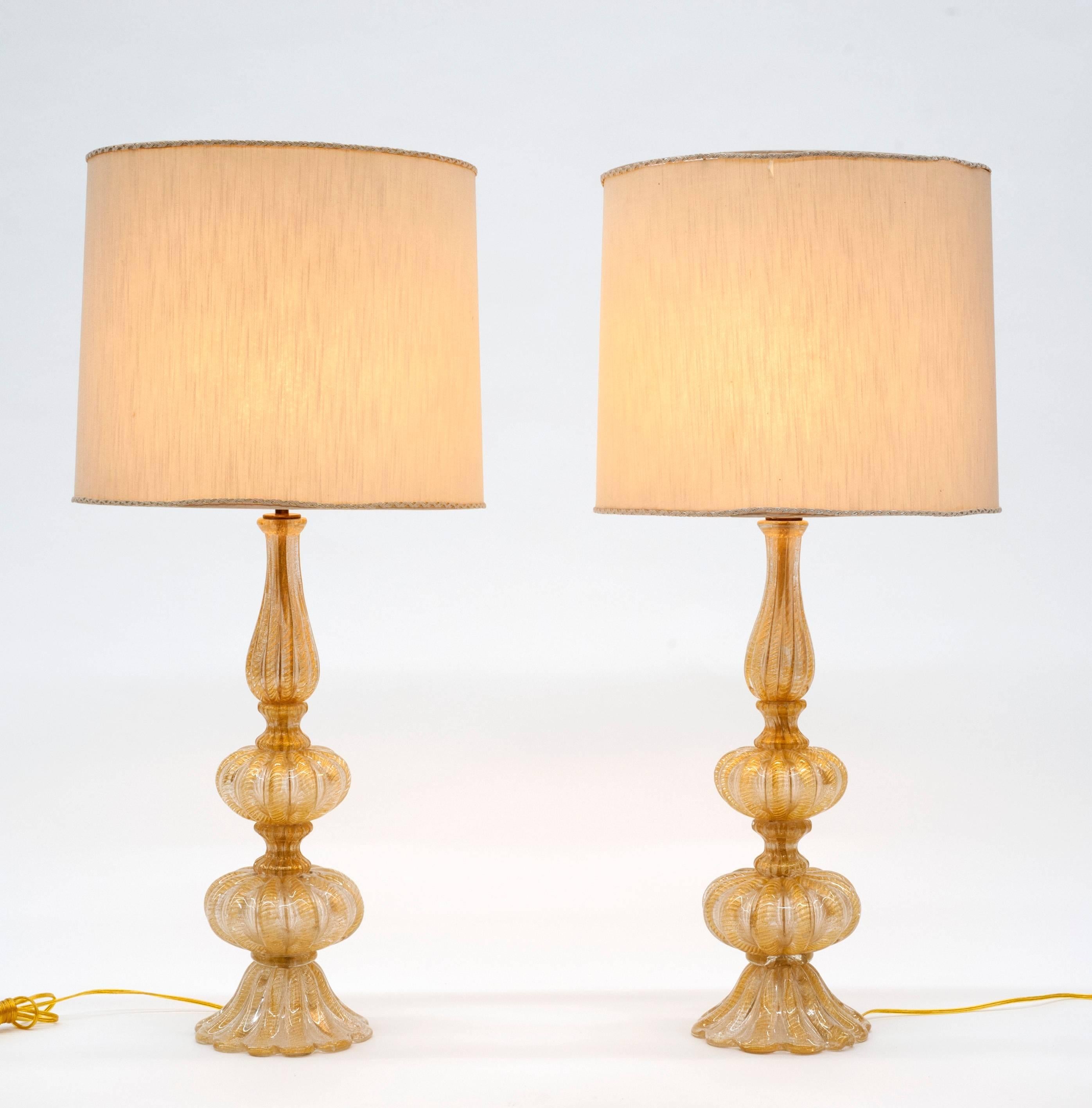 Fantastic pair of vintage glass lamps by Barovier & Toso. Lamps are heavy and exceptionally made. Rewired and ready to be enjoyed. One lamp has small bottom detail missing (please see last photo). 
