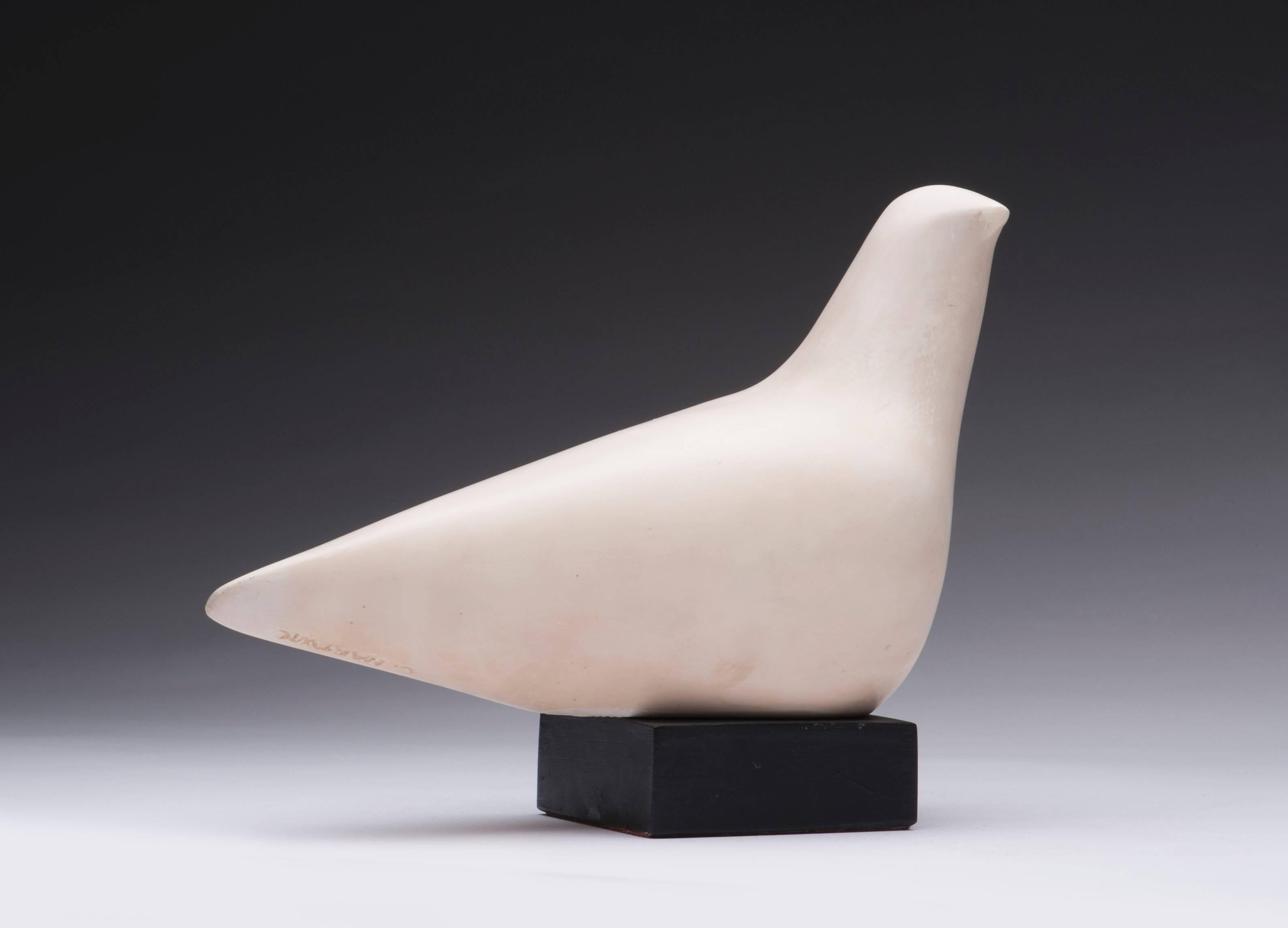 Vintage modernist abstract dove sculpture by Cleo Hartwig (1907-1988). Incised signature to underside. Cast in foundry stone, condition is excellent.