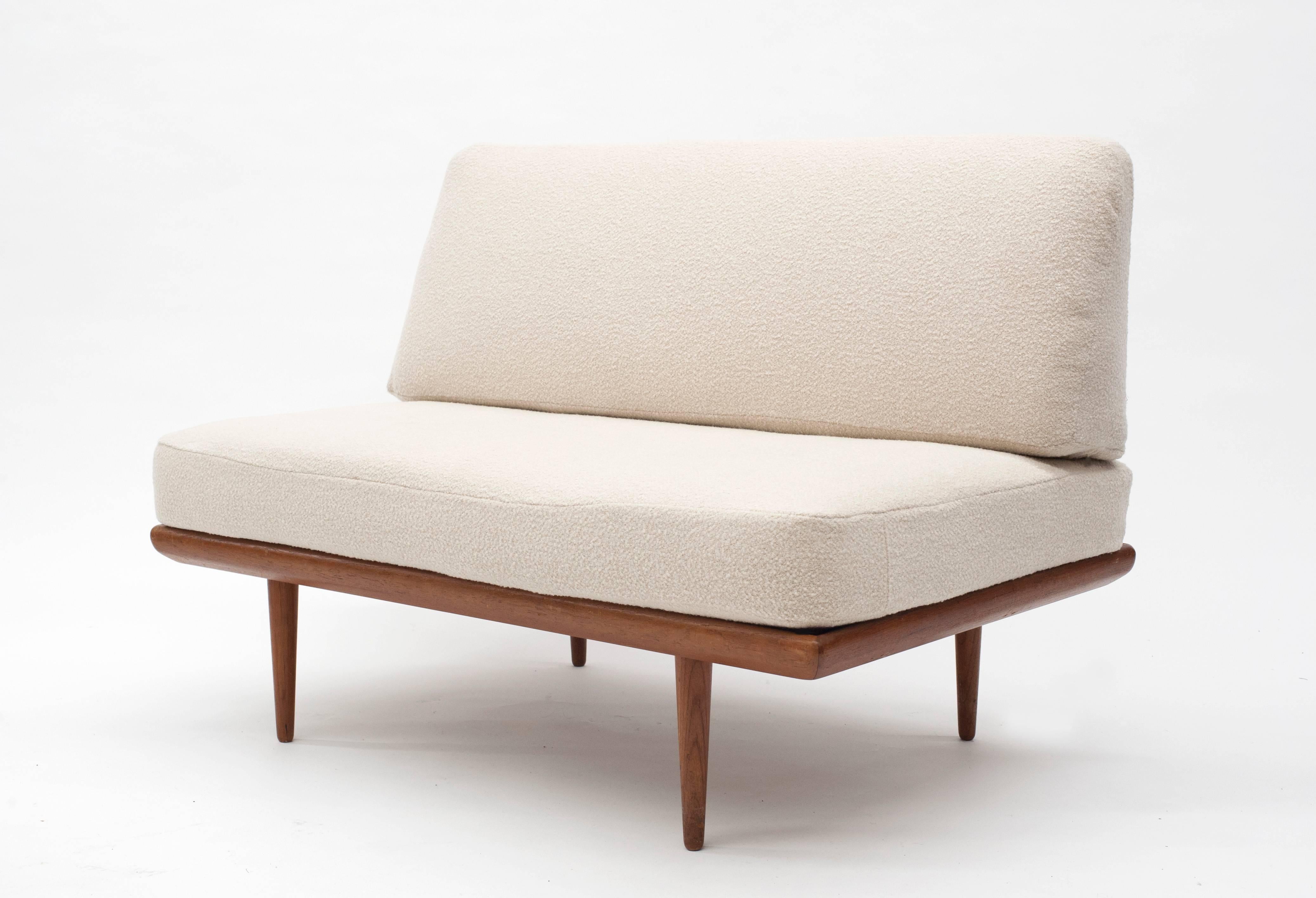Low profile modern settee by Peter Hvidt & Orla Mølgaard-Nielsen for France & Son, Denmark. Settee comes with one arm rest and is designed for side table to be on opposite side. Inner sprung cushions are original and newly upholstered in premium