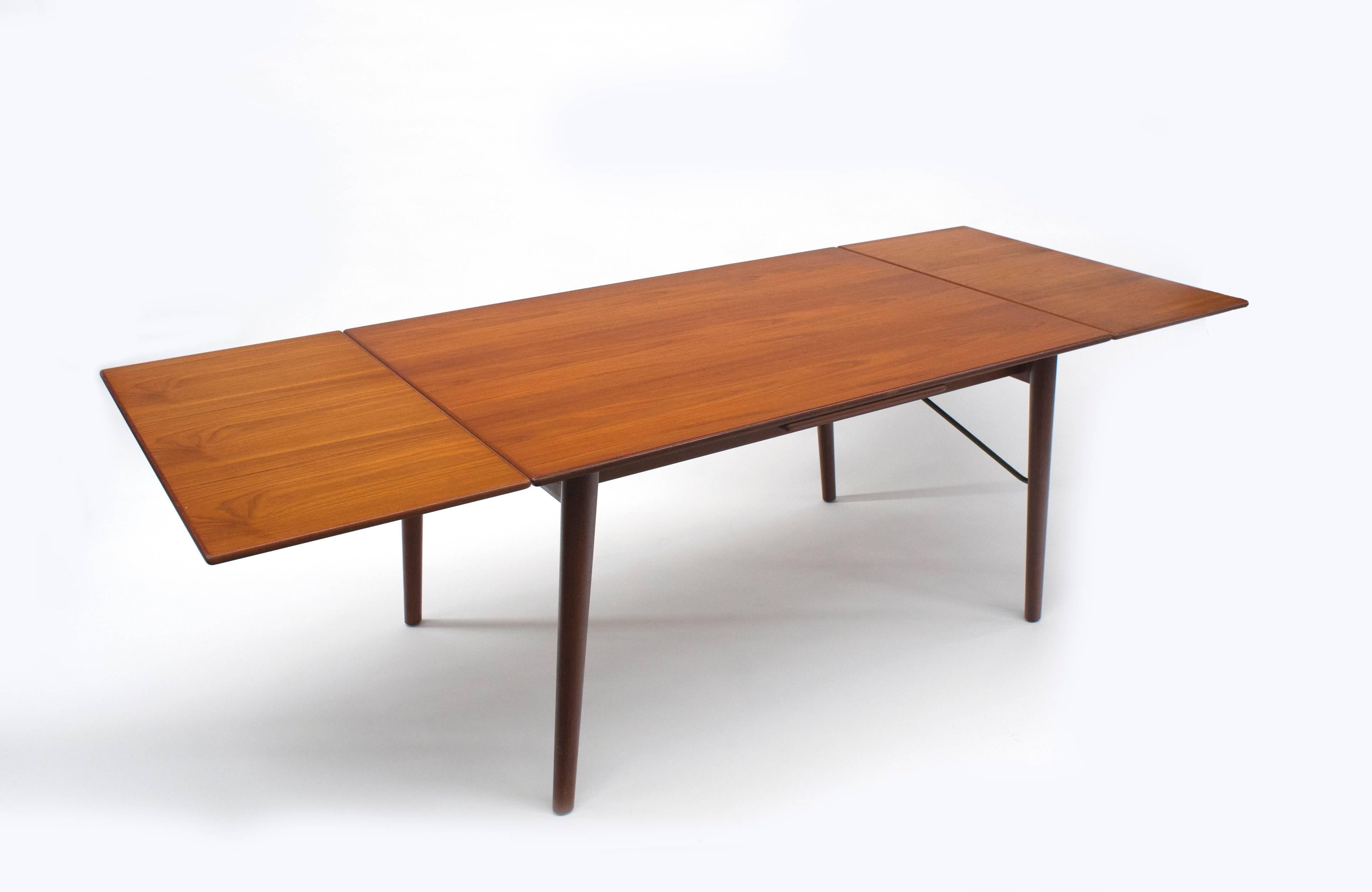 Mid-Century Modern Extendable Danish Modern Teak Dining Table by Peter Hvidt