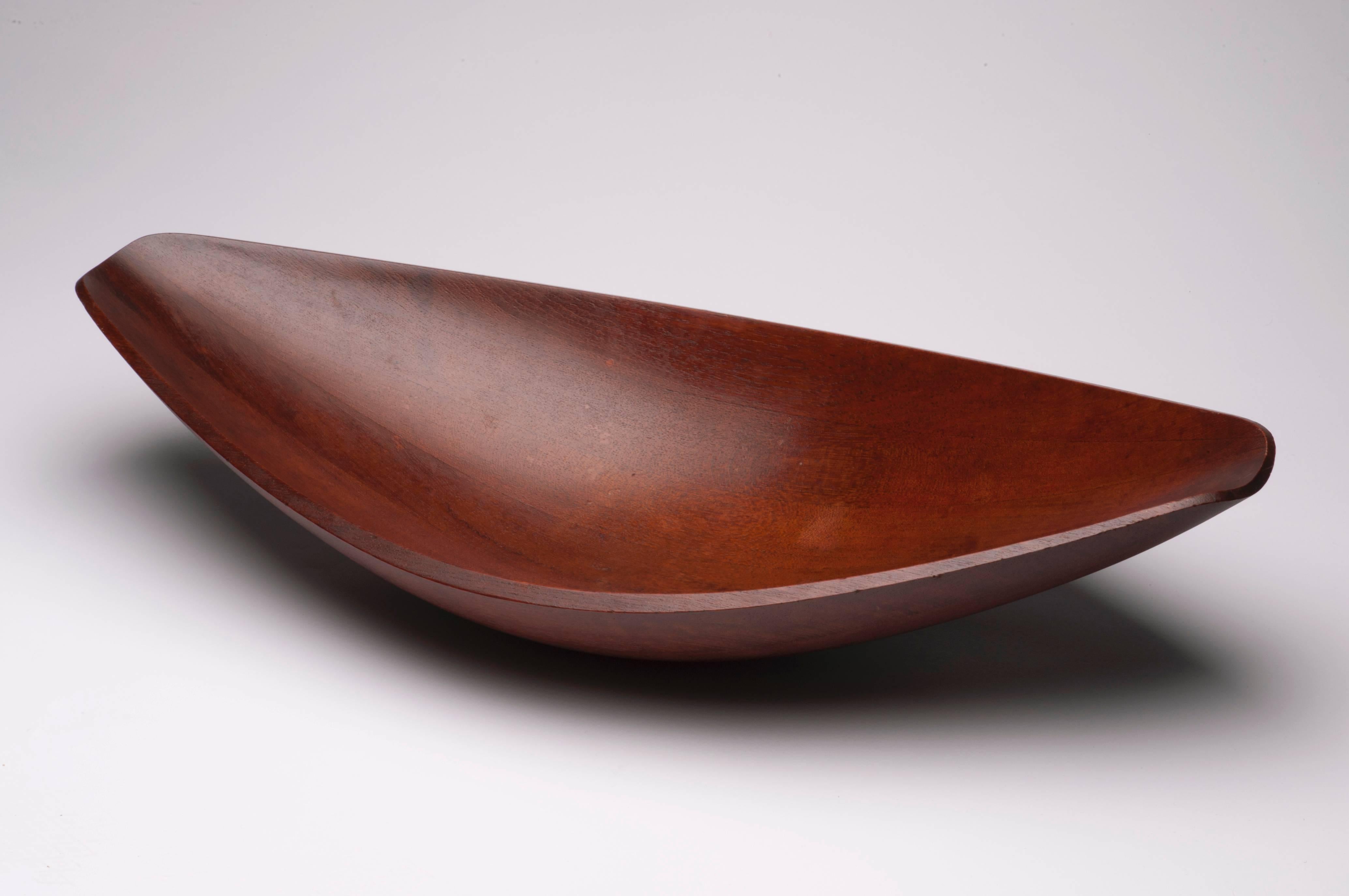 Beautiful large teak bowl by Danish designer Jens Quistgaard. Teak has developed a nice dark patina. Bowl is 25