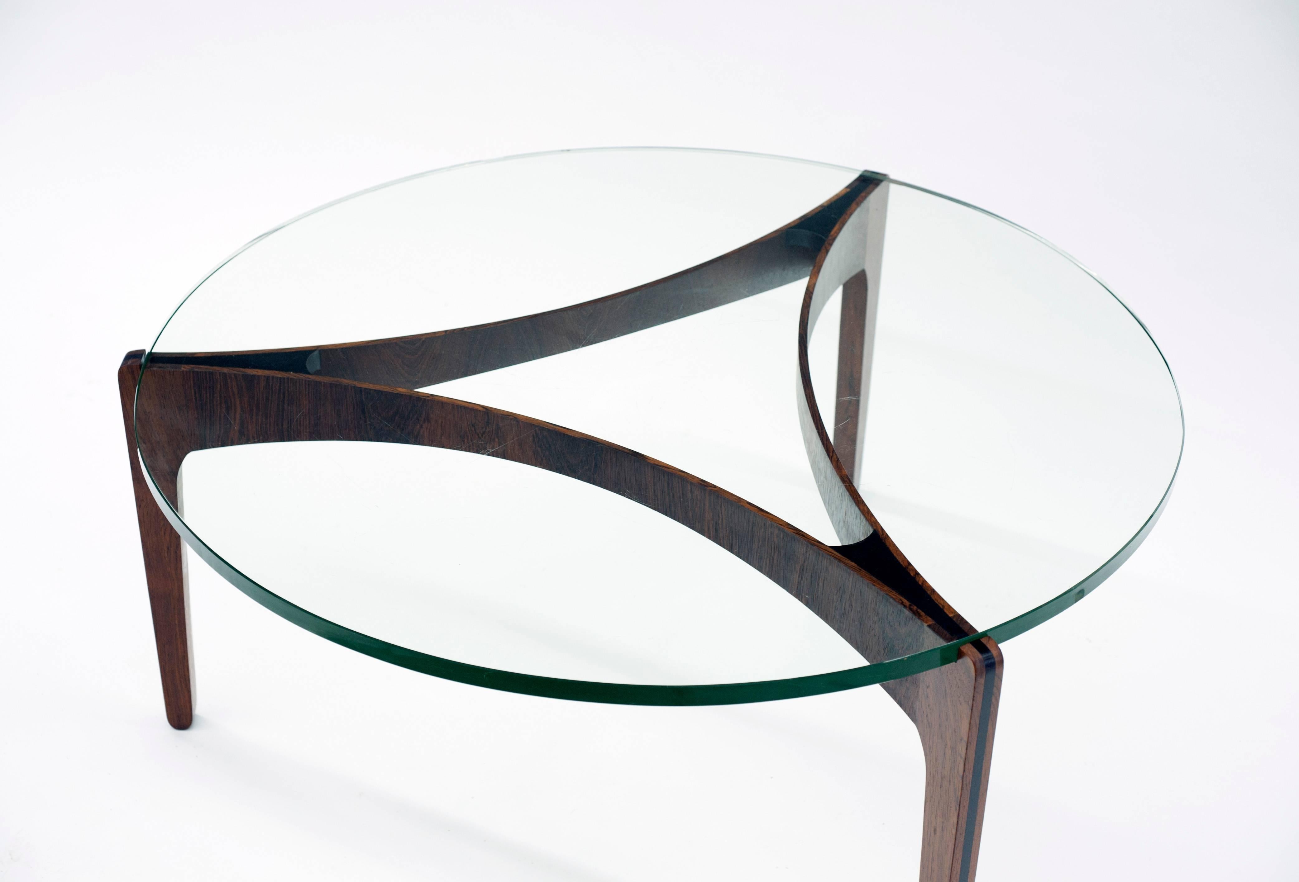 Rosewood and Ebony coffee table with original glass designed by Sven Ellekaer and manufactured by Christian Linneberg, Denmark. Rosewood coffee base with ebony details is in excellent condition. Glass has expected wear in the form of some light