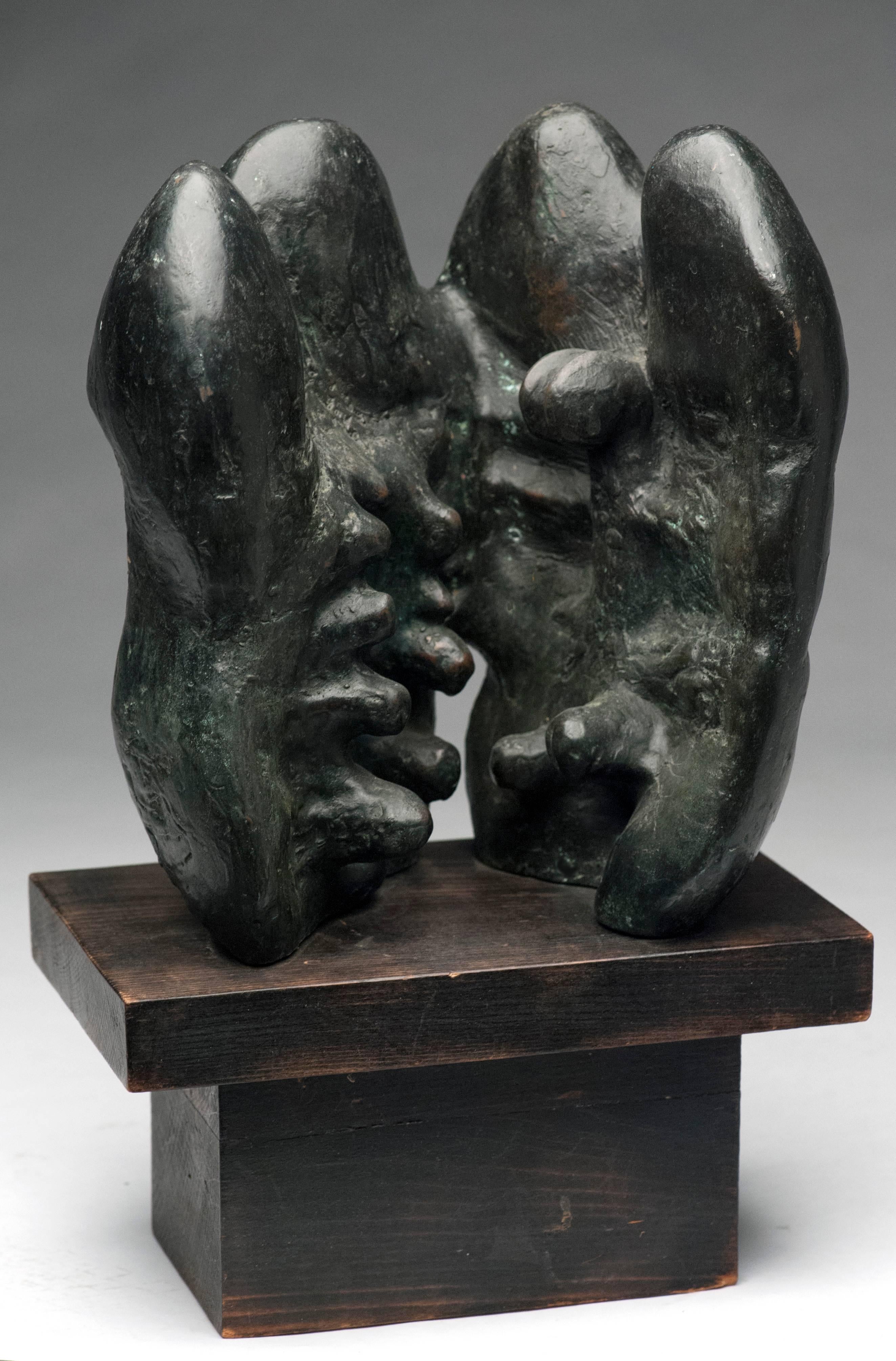 Appealing bronze sculpture by Latin American sculptor Raúl Valdivieso (Chilean, 1931-1993). Valdivieso is known for his reinterpretation of the Classic organic forms and human figures. Sculpture is signed and retains original wood base. 

Raúl
