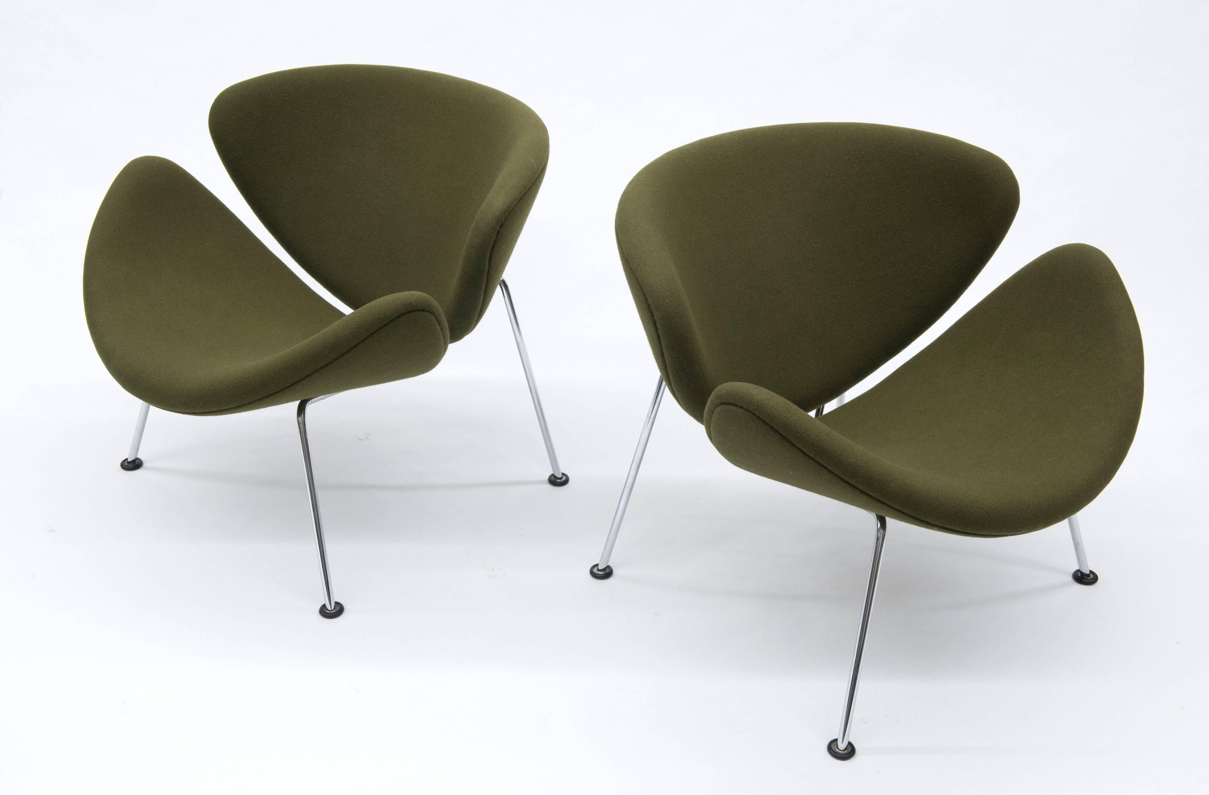 Pair of slice chairs designed by Pierre Paulin for Artifort. Exceptional quality and extremely comfortable. Metal labels to underside. Condition is excellent.