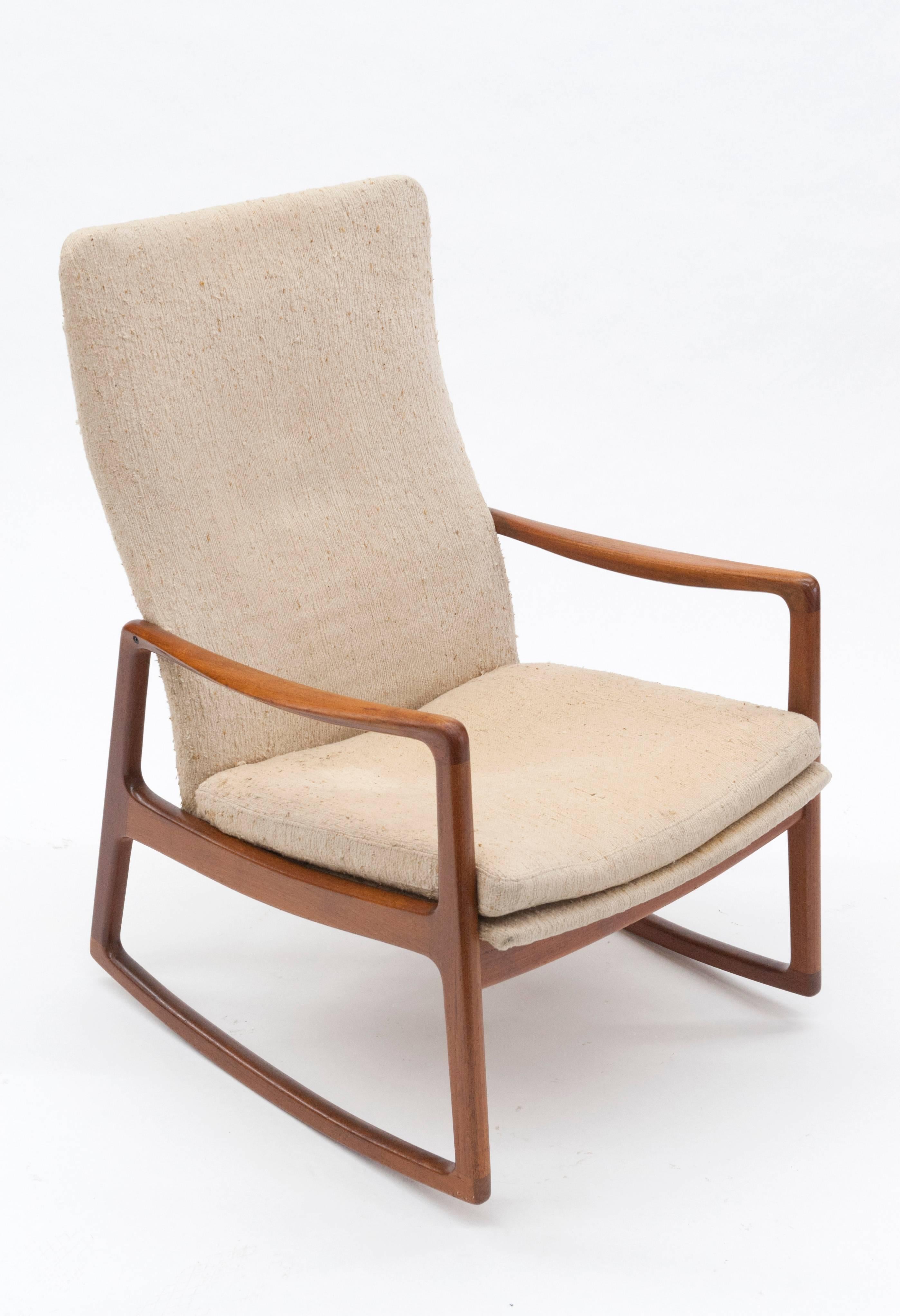 Hard to find high back rocking chair by Ole Wanscher for France and Son. Classic Scandinavian design. Solid teak frame is in excellent condition. New foam and upholstery is needed.