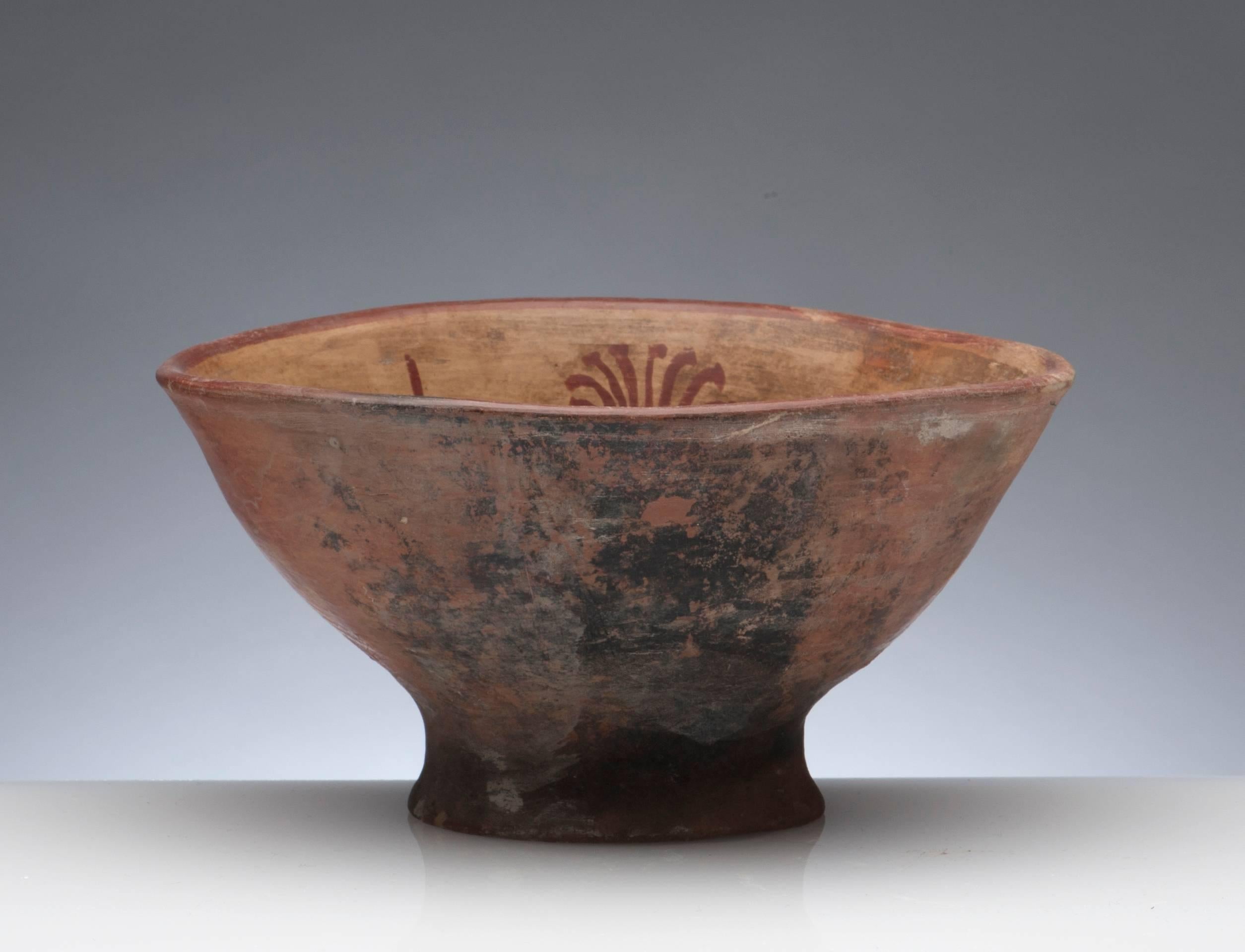 Fine Pre-Columbian Narino footed bowl from Columbia,  circa 850 to 1500.  Bowl depicts the rare warrior image with alternating eight pointed star symbol, most likely Venus.