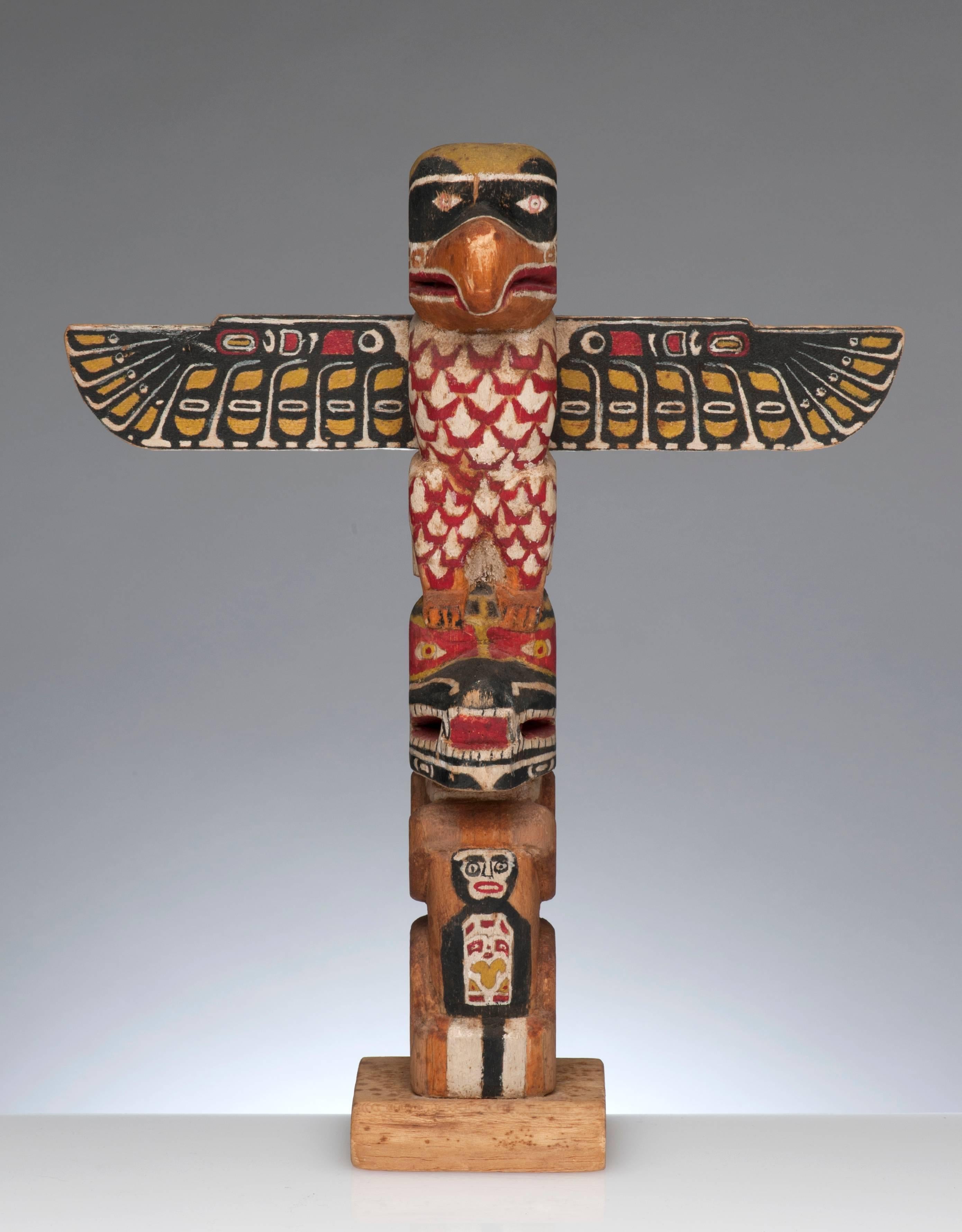 Very appealing hand-carved and painted wood TOTEM pole. Signed Kenneth McNees to underside and dated 1952.