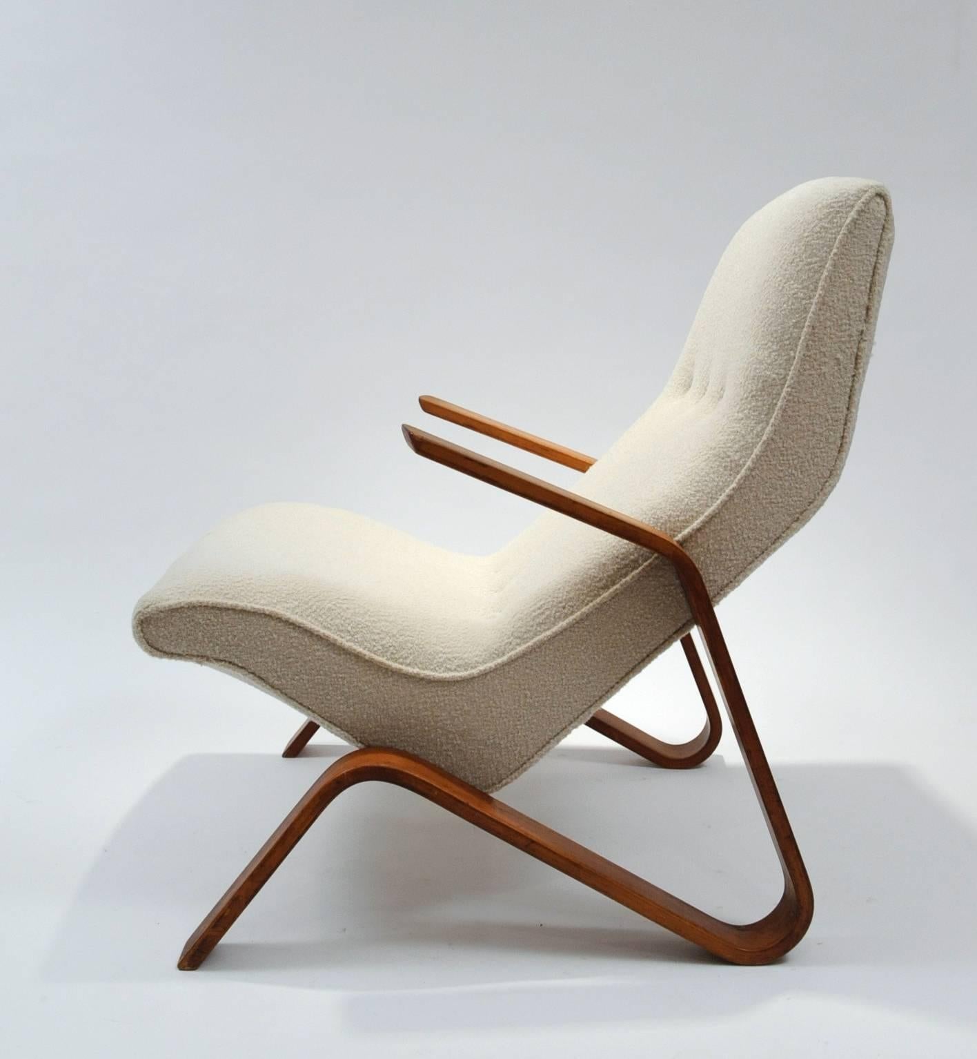 Excellent example of an early Saarinen Grasshopper chair by Knoll. The chair has been professionally reupholstered with bouclé Knoll upholstery. Frame is in excellent condition and retains original patina.