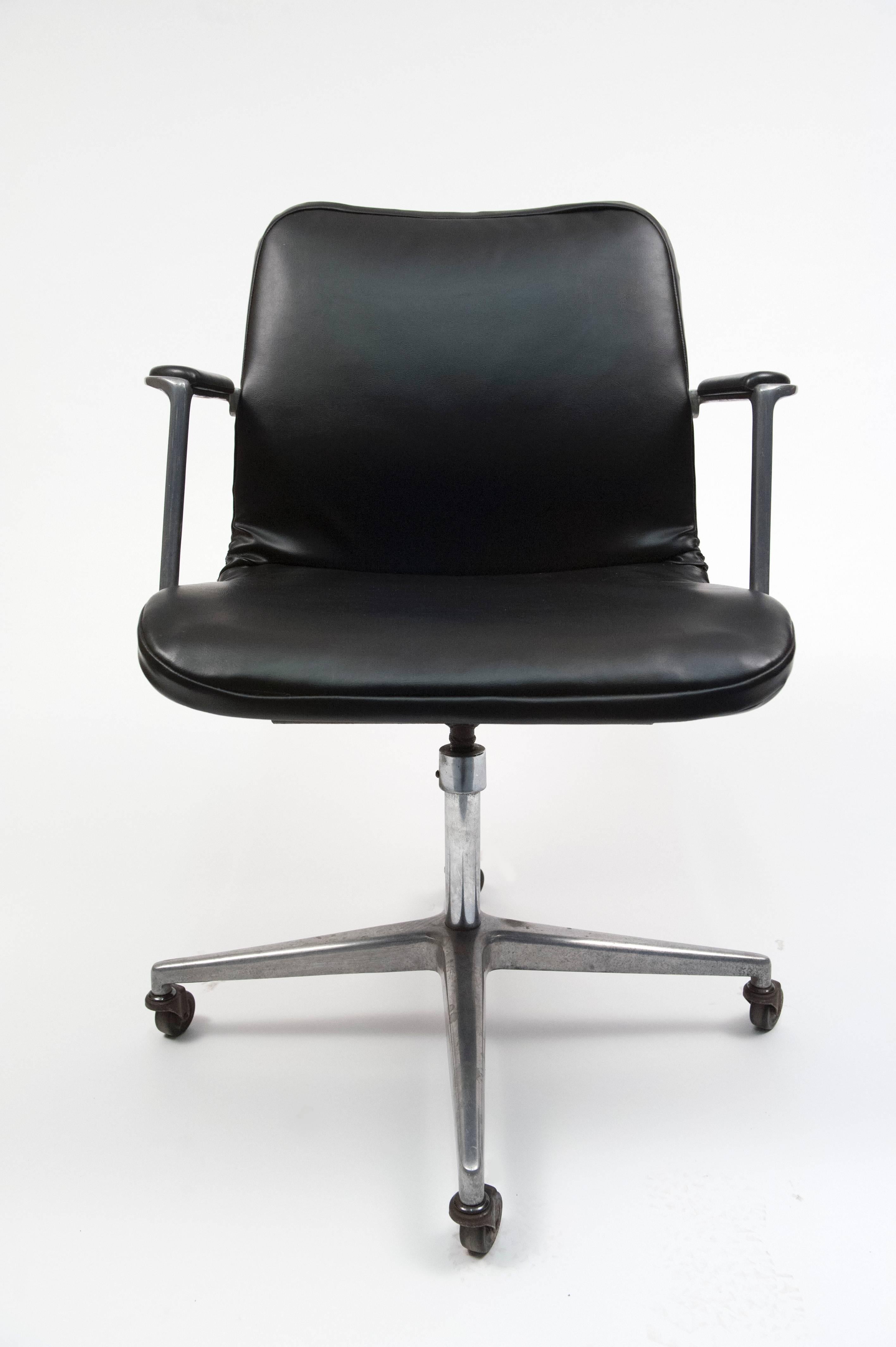 Unusual and early Charles & Ray Eames office chair. Herman Miller paper label to underside. The casters are original and the seat height is adjustable.