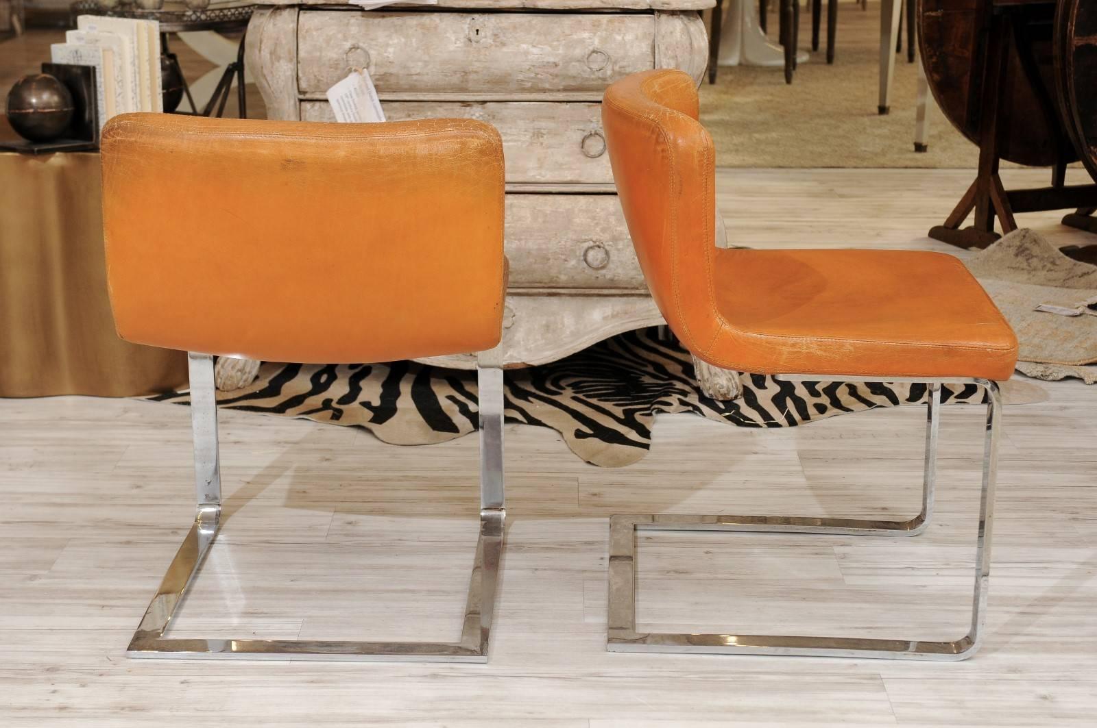 20th Century Pair of French Mid-Century Modern Leather and Chrome Accent Chairs