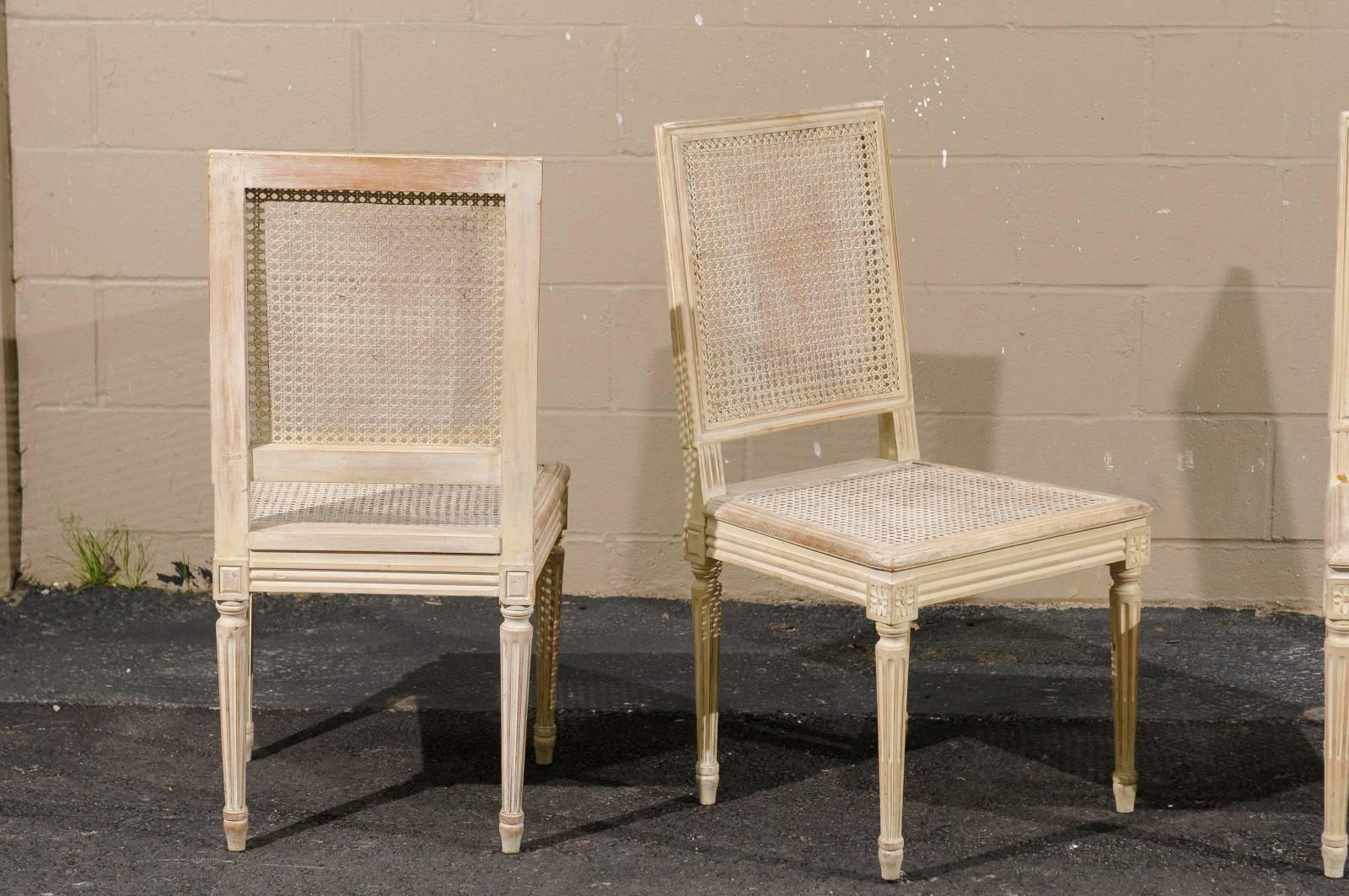 Set of Four French Louis XVI Style Painted Wood and Cane Dining Chairs, 1970s 1