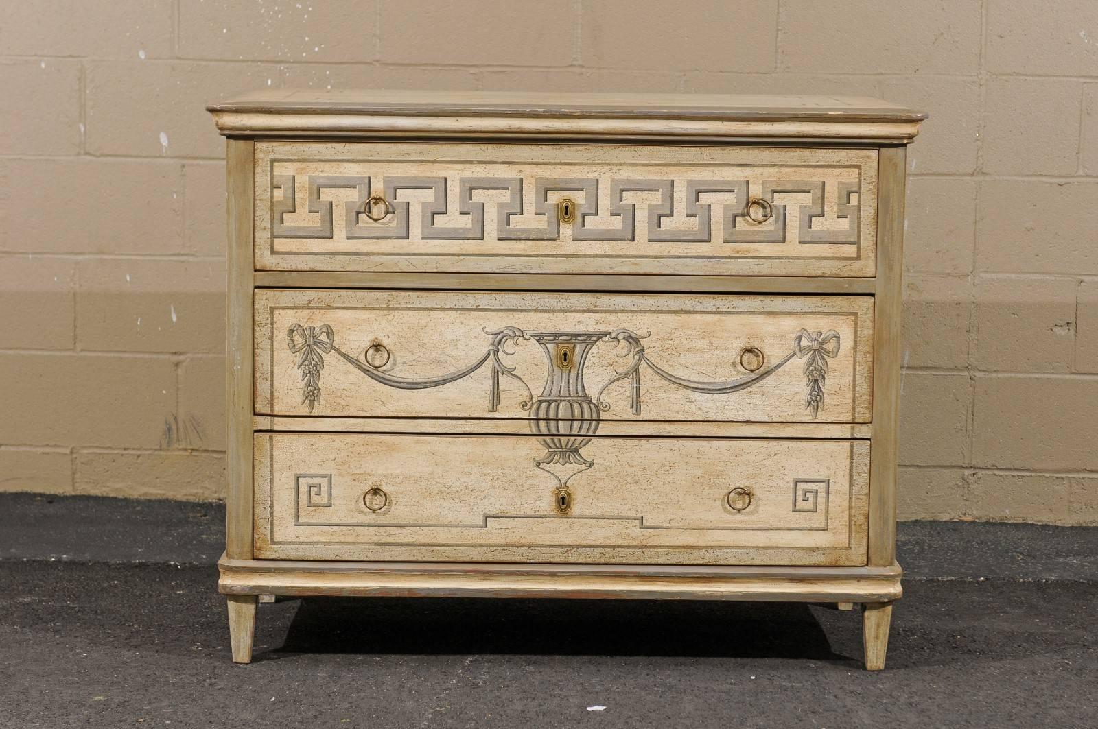 This German neoclassical style painted commode from the mid-19th century features a rectangular top over three beautifully painted drawers. We've been stalking these painted commodes for years and finally took the plunge with this beauty: a pretty