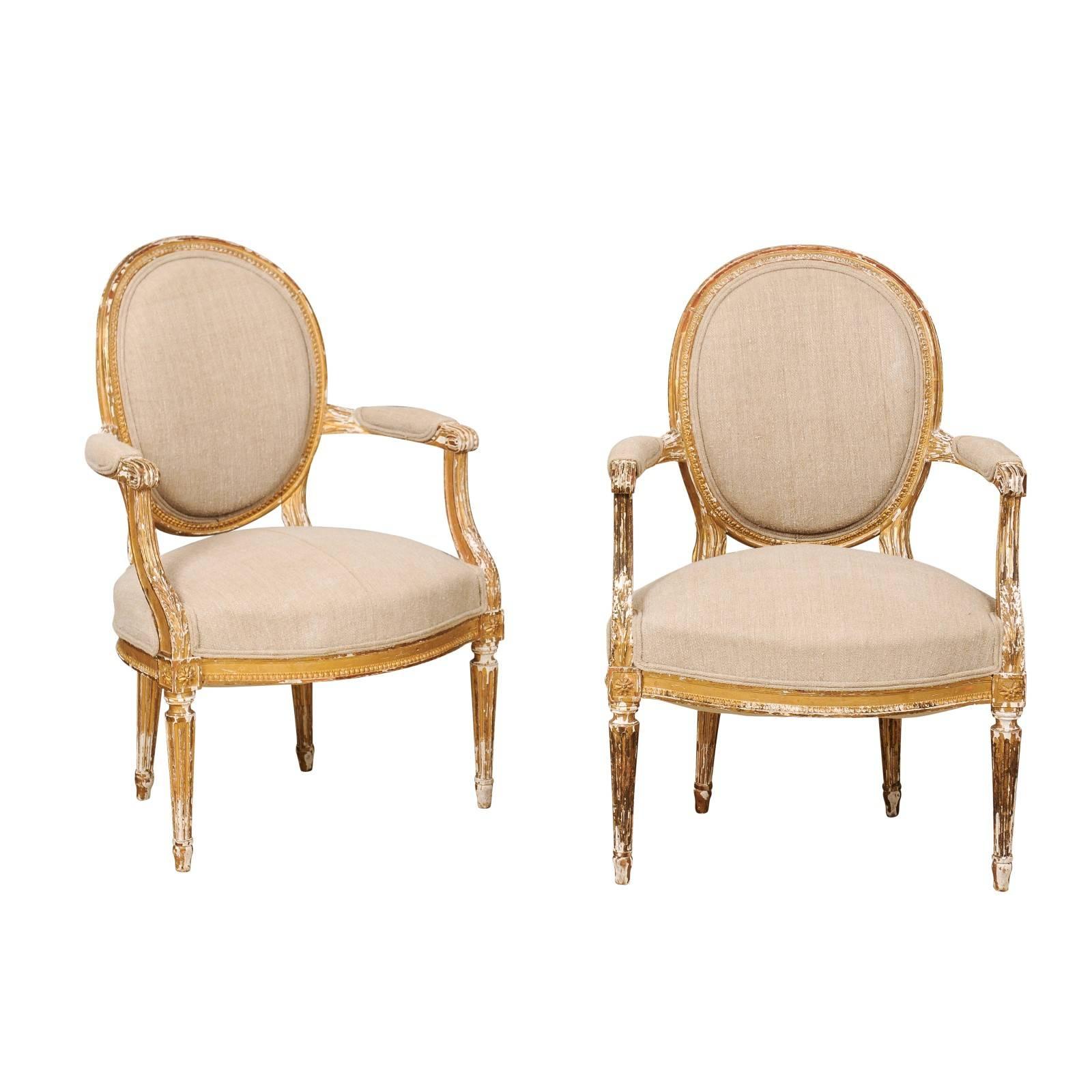 Pair of French Louis XVI Style Giltwood Fauteuils with Oval Backs with Linen