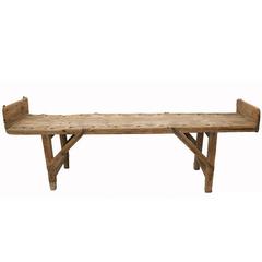 French Rustic Wooden Backless Pearling Bench from the Mid-19th Century