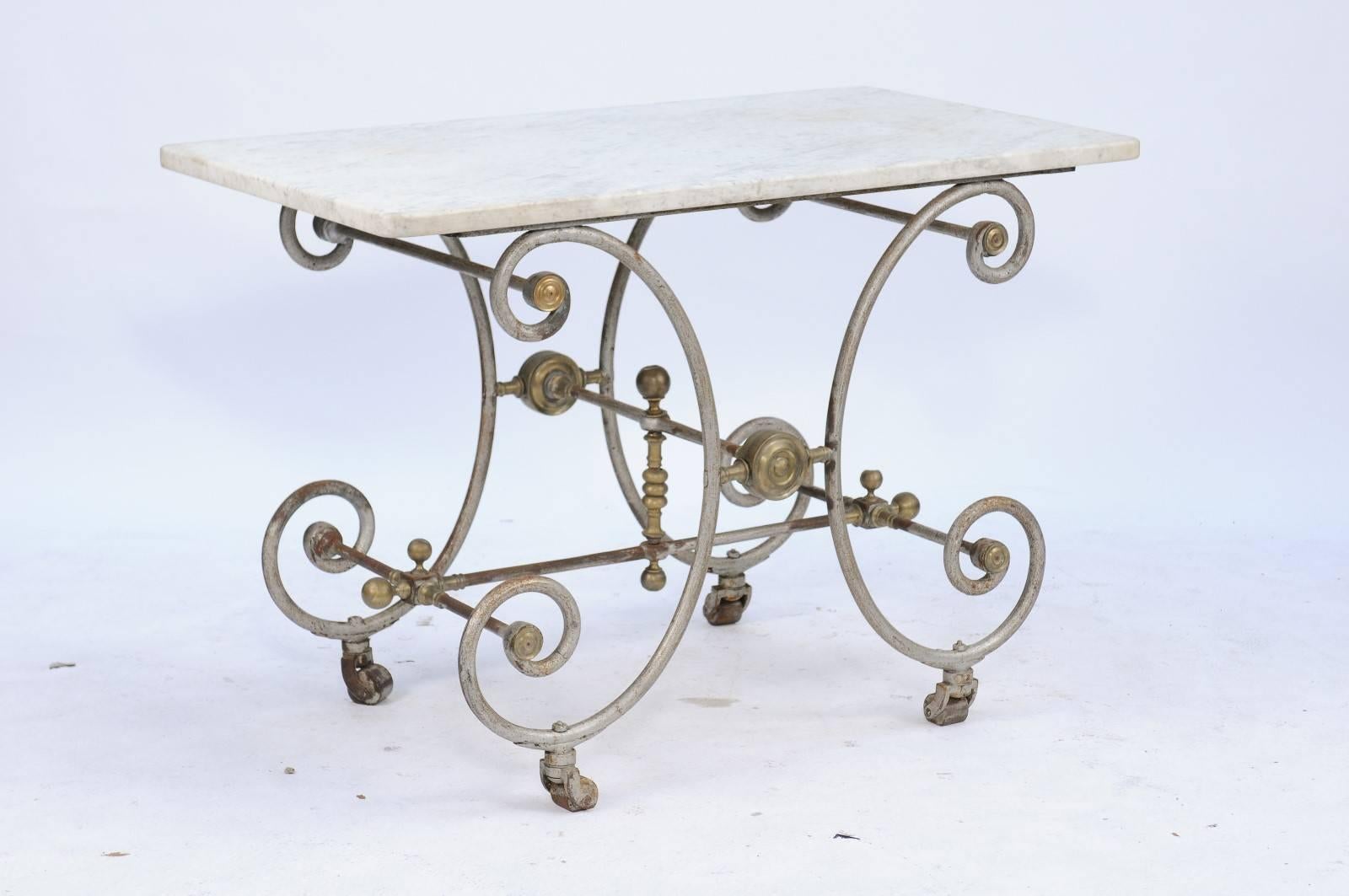 Industrial French Iron and Marble-Top Baker's Table with Curly Gilded Legs and Casters