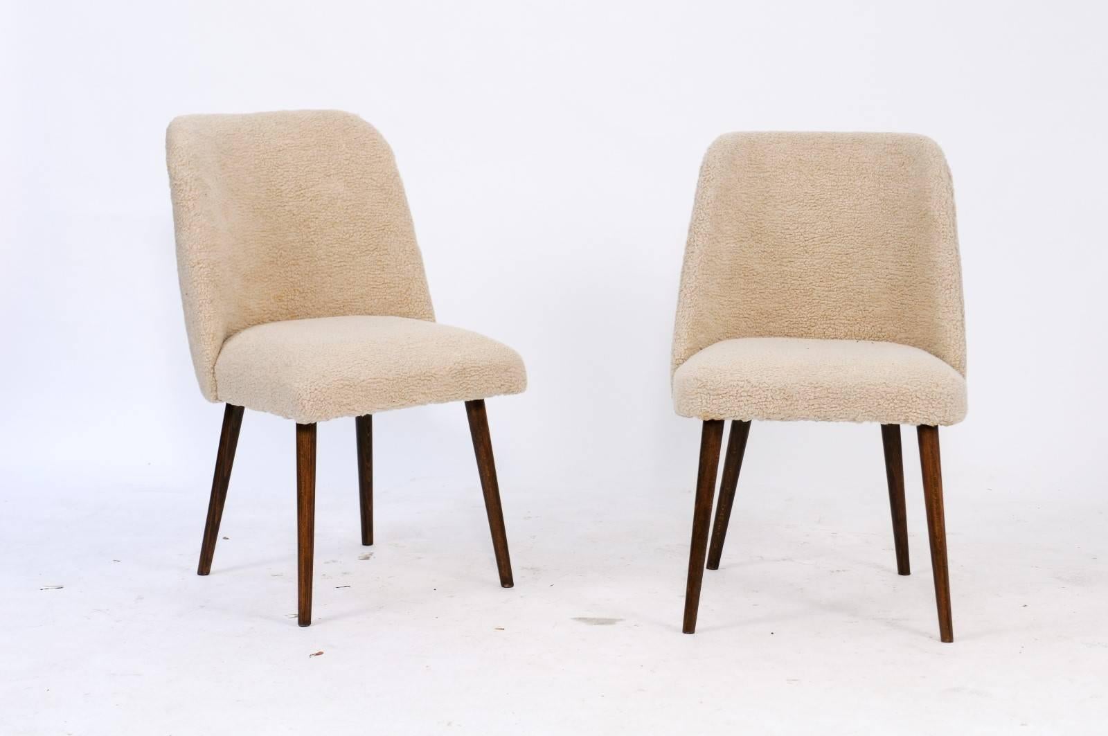 A pair of French 1950s mouton upholstered chairs. What do you get when you mix some 1950s attitude with a little 2017 je-ne-sais-quoi? For us, it’s sassy, fun chairs with retro frames and eye-catching mouton upholstery! As comfortable as they are