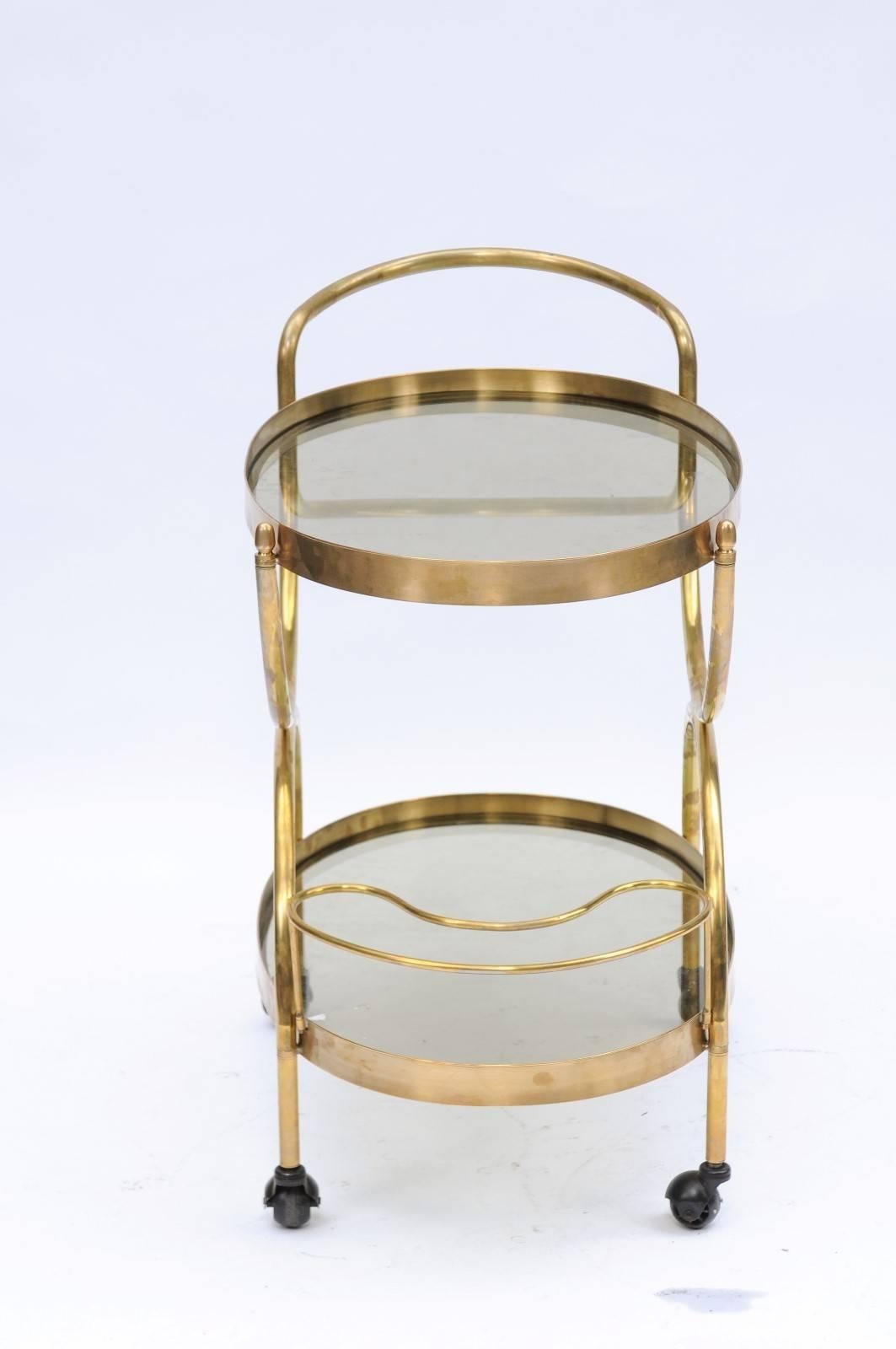 Mid-Century Modern Florentine, 1950s, Two-Tiered Oval Brass and Glass Bar Cart with Curvy Lines