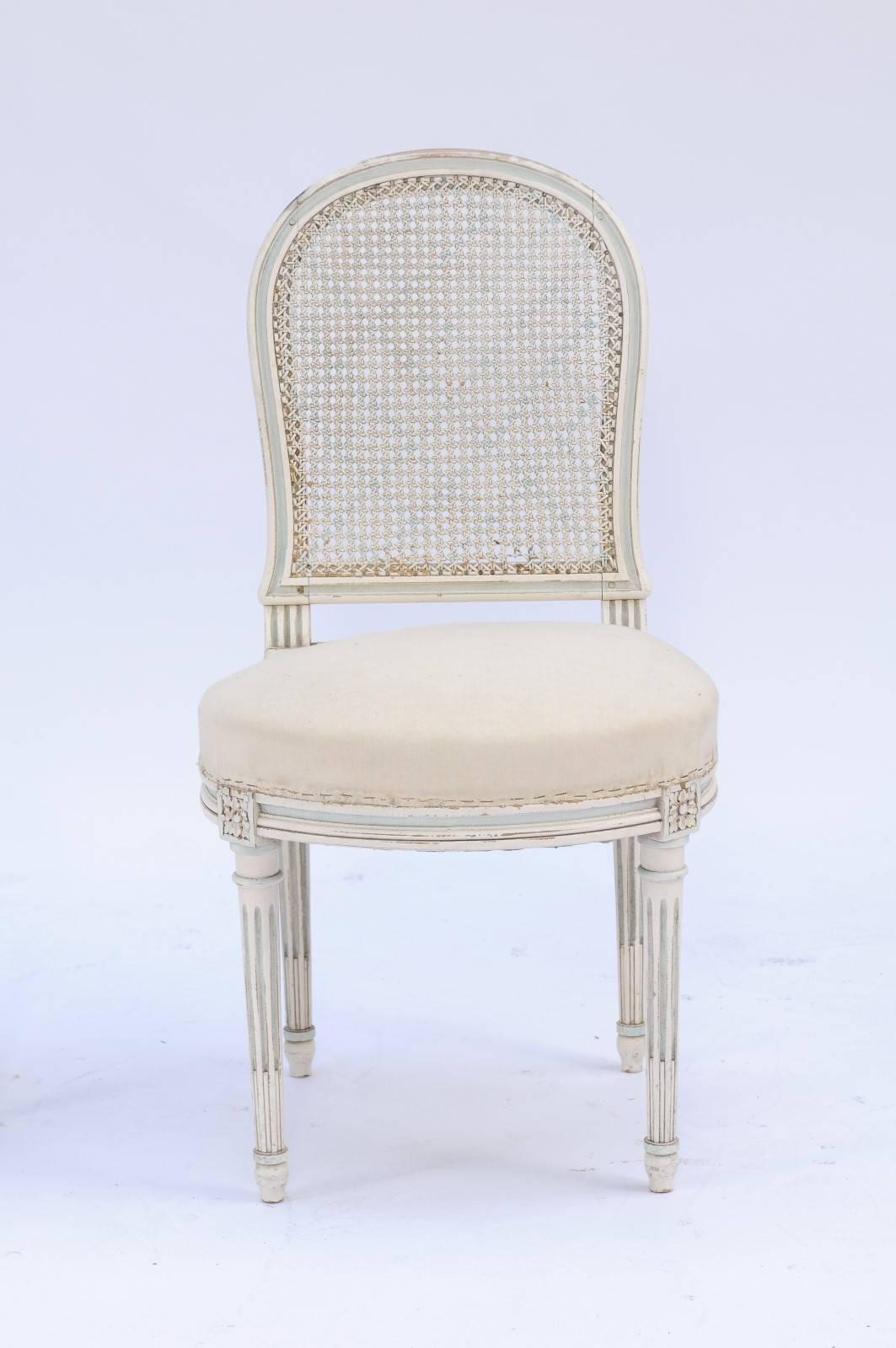 Pair of Northern French Louis XVI Style 1940s Dining Chairs with Cane Backs In Good Condition In Atlanta, GA