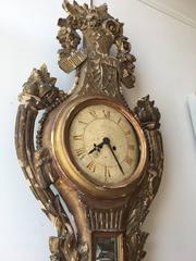 French 18th Century Giltwood Louis XV Decorative Wall Clock with Floral Motifs