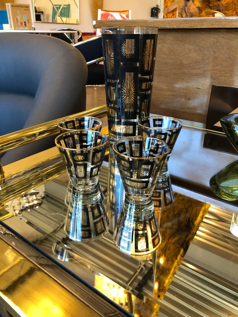 Mid-Century Modern Black and Gold Starburst Shaker and Four Rocks ...