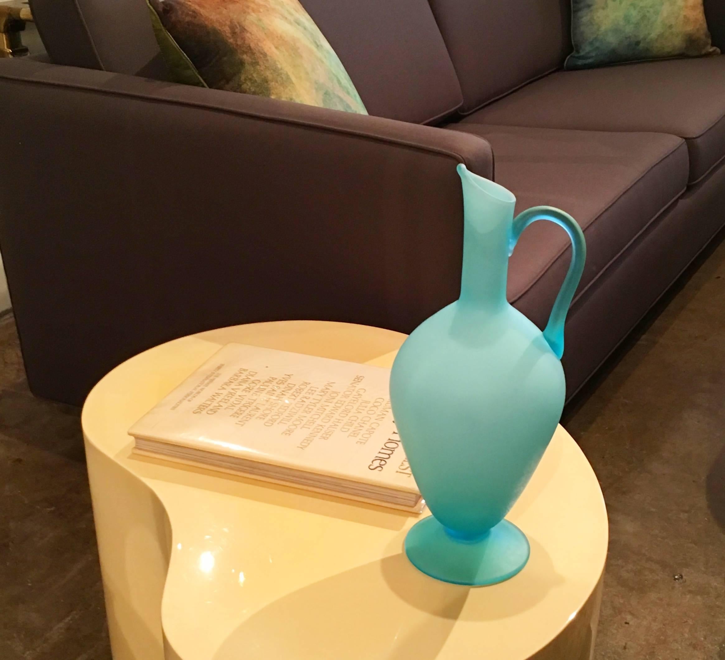 Offered is a sandblasted glass urn / pitcher in robin's egg blue.   The blue is stunning and would look beautiful with almost any decor.