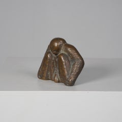 Bronze Sculpture of a Crouching Male Figure, Signed LN