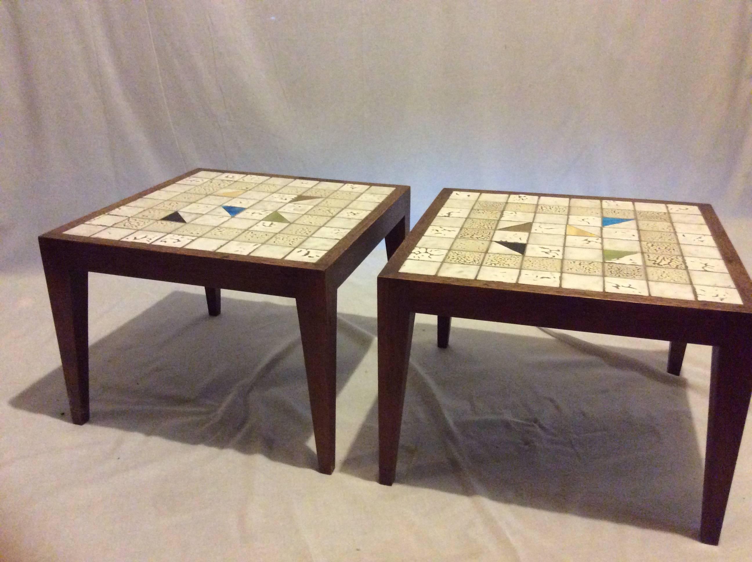 Pair of mid-1960s mosaic and walnut side table.
Use together as cocktail table or occasional tables.
Geometric tile design. Elegant tapered legs.
In extraordinary 'mint' condition.
 