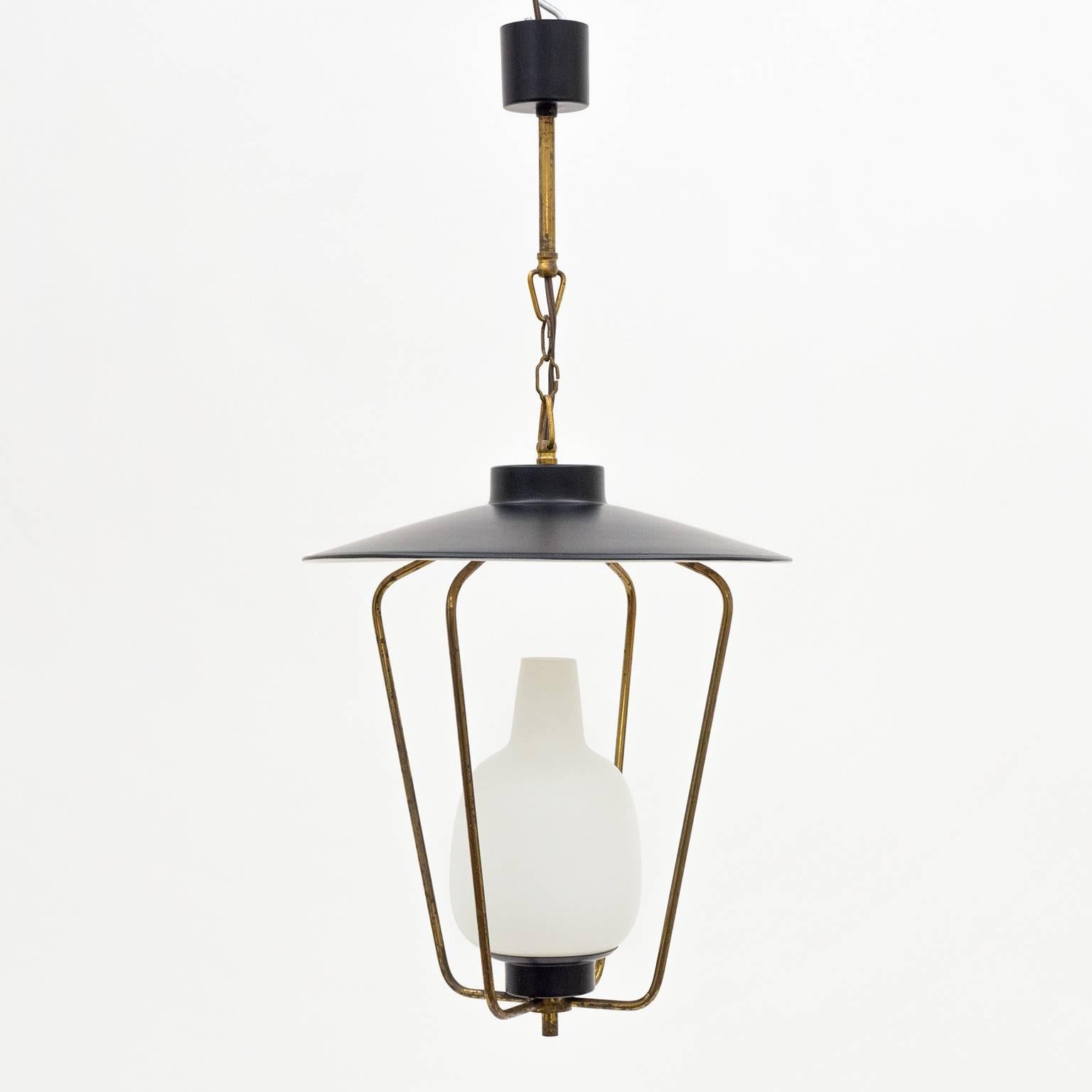 Charming modernist lantern pendant attributed to Stilnovo, 1950s. Satinated 'triplex opal' glass, brass (with patina) and lacquered aluminum. One original brass E14 socket with new wiring.