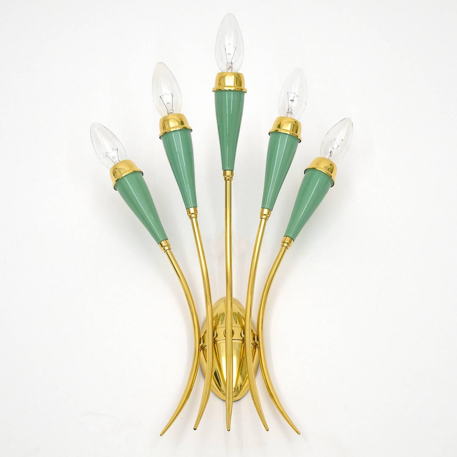 Elegant Italian Mid-Century wall light in brass and lacquered aluminium. The original paint is of a pastel-mint hue and is in excellent condition. Five brass arms each with an original brass E14 socket with new wiring.