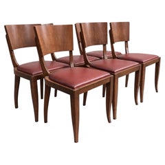 Sei sedie da pranzo francesi in stile Art Déco, in noce e pelle rossa, anni ’40